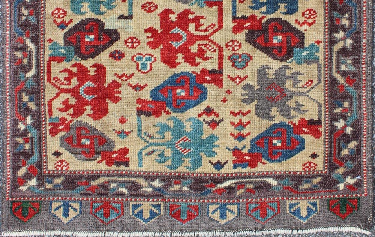Hand-Knotted Midcentury Vintage Turkish Oushak Rug with All-Over Tribal Pattern in Cream For Sale