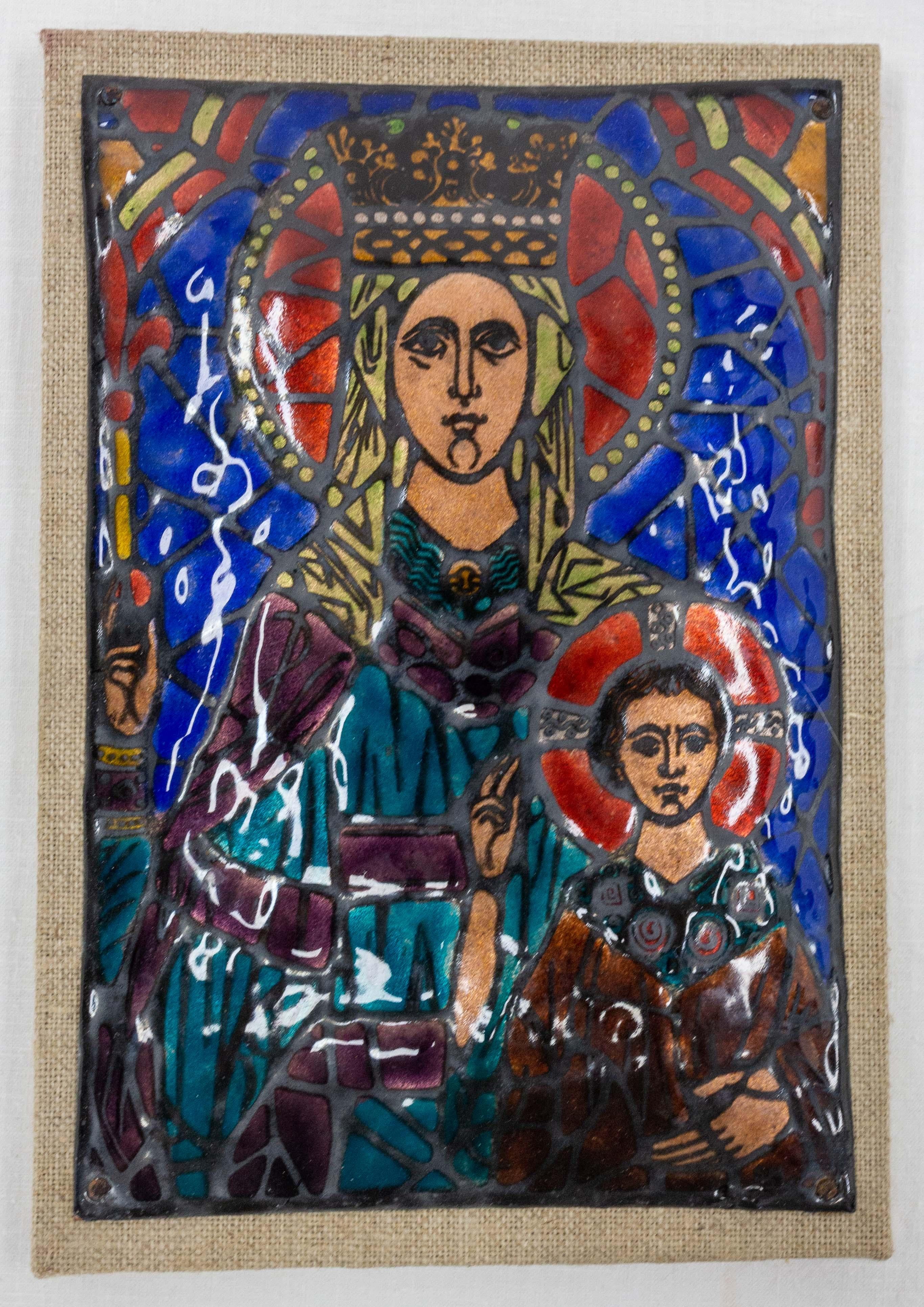 Virgin Mary and Baby Jesus enameled wall plaque.
French, mid-century.
Reproduction from a stained glass window of Reims cathedral (13th century) by the monks of Ligugé Abbey
Good condition with minor signs of age.


