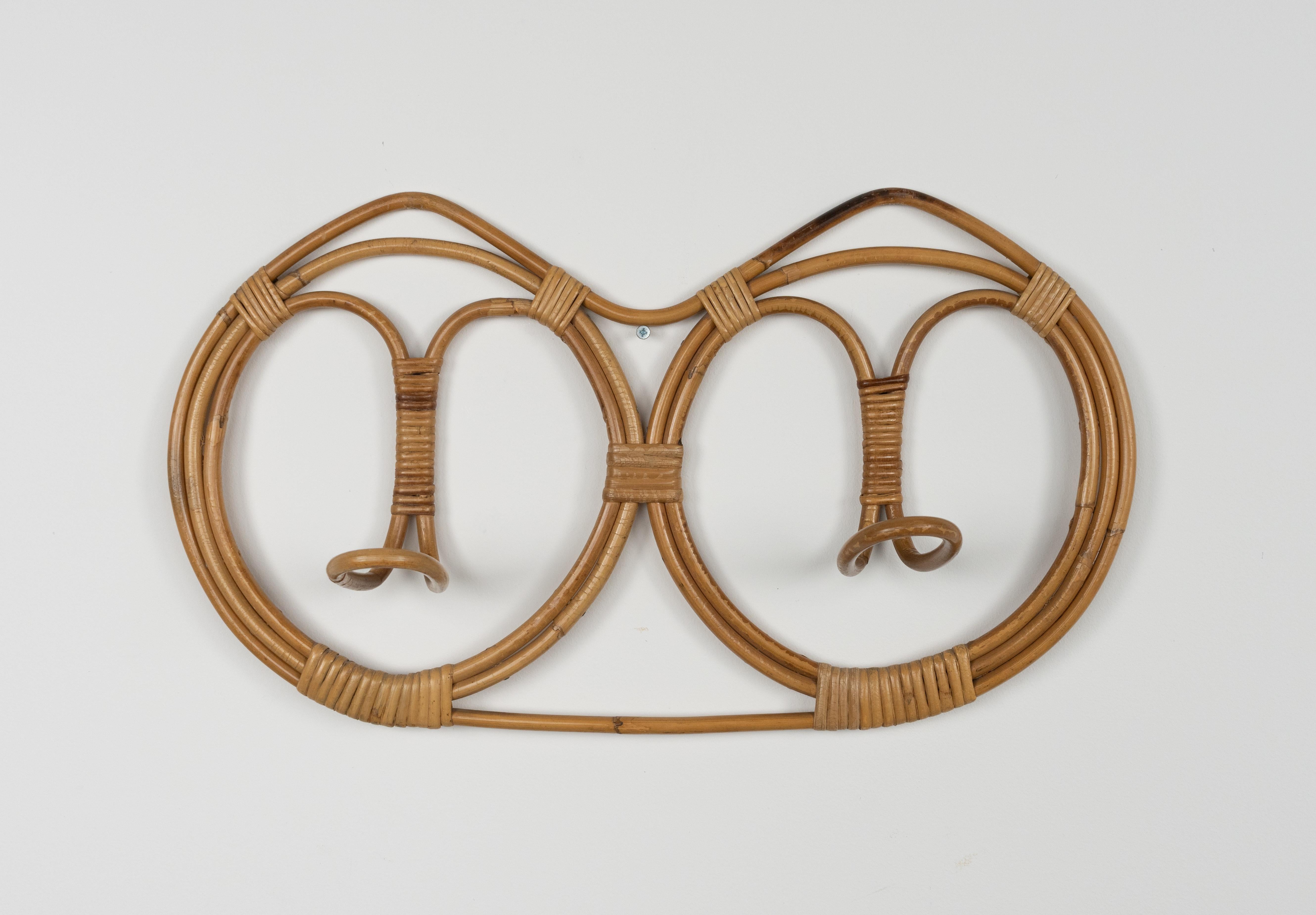 Midcentury beautiful wall coat rack in bamboo and rattan by Franco Albini & Franca Helg.

Made in Italy in the 1960s.