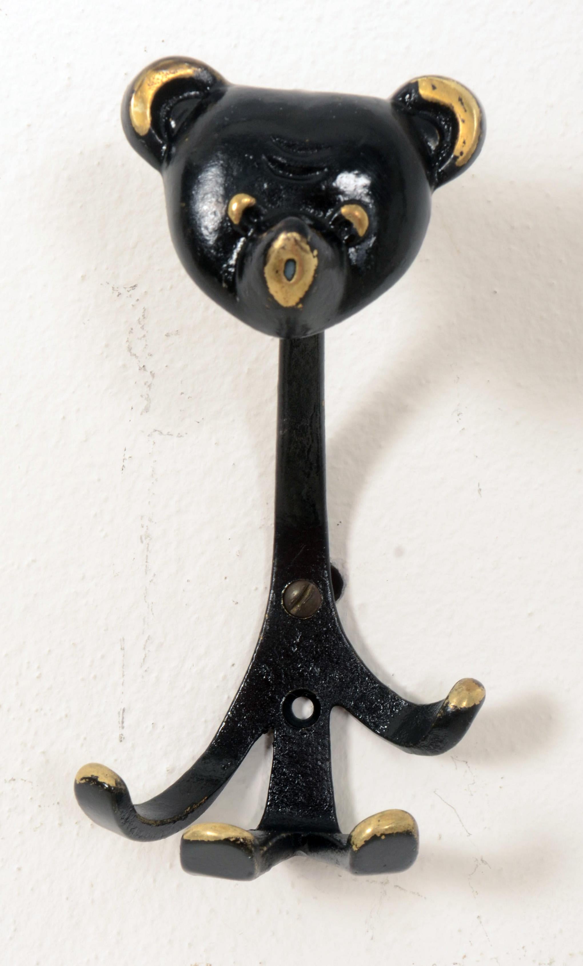 Rare brass ebonized wall hook 