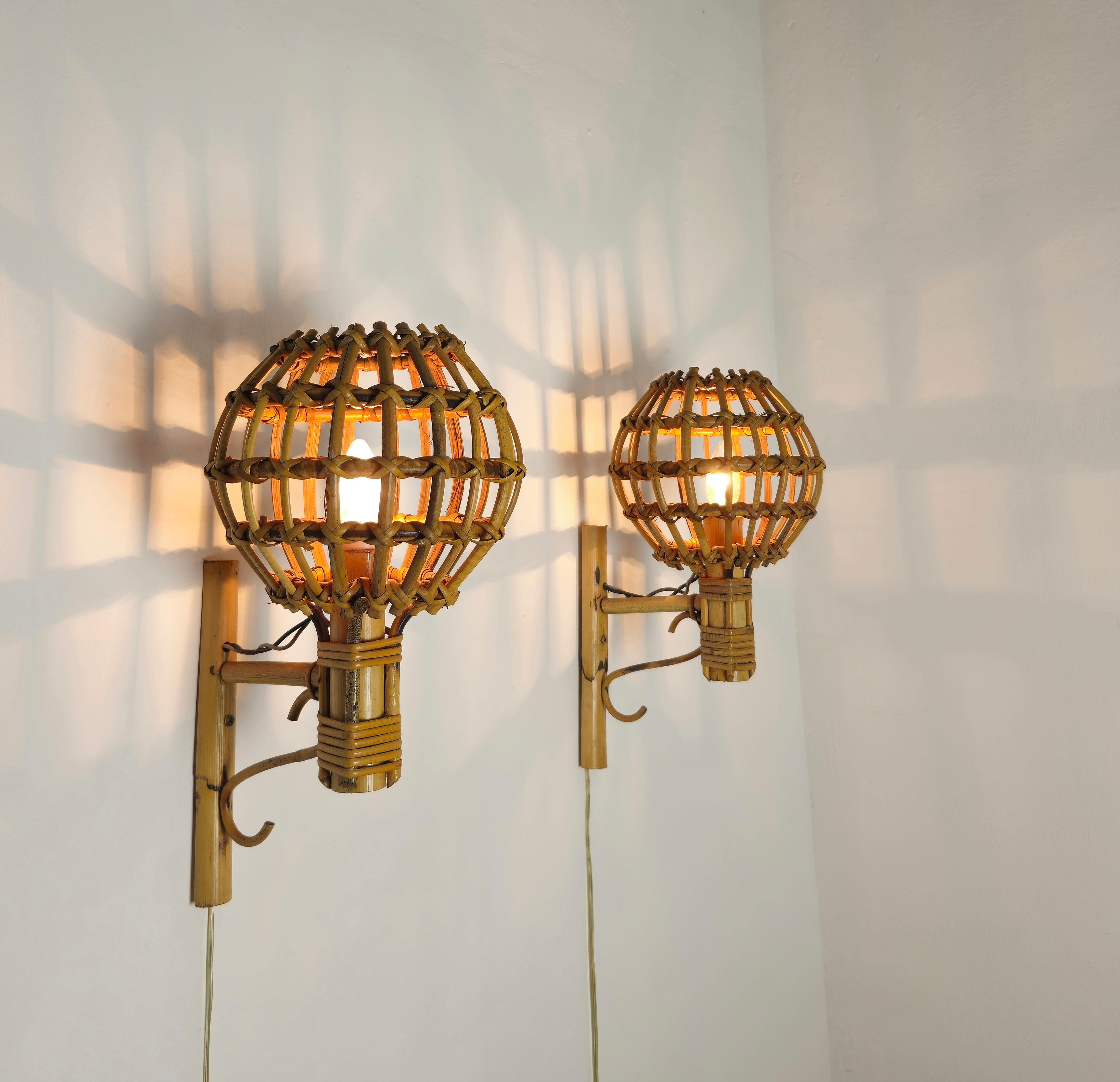 Set of 2 wall lights attributed to the French designer Louis Sognot and produced in France in the 60s.
Every single 