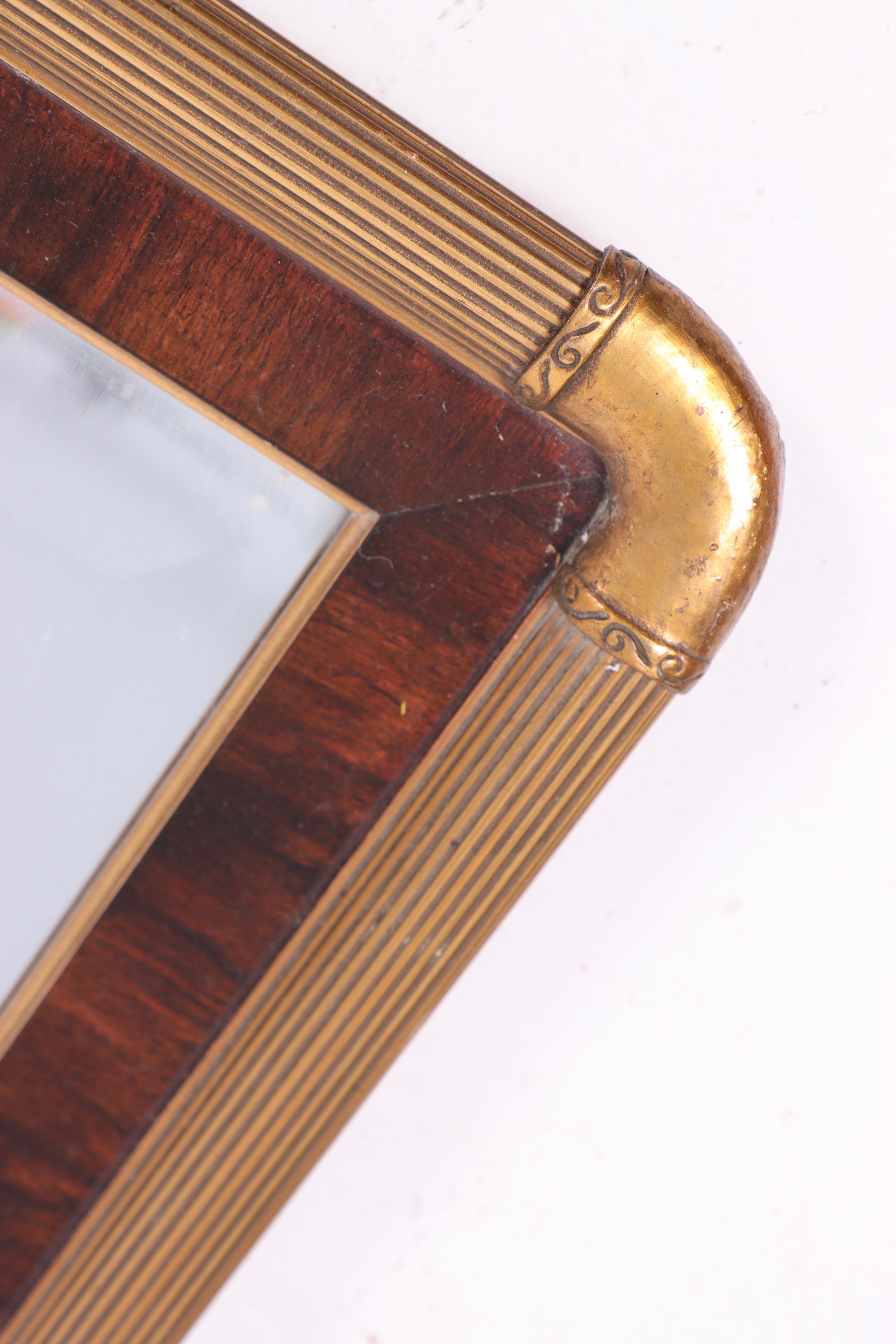 Wall mirror in Rosewood, designed and made in Sweden. Great original condition.