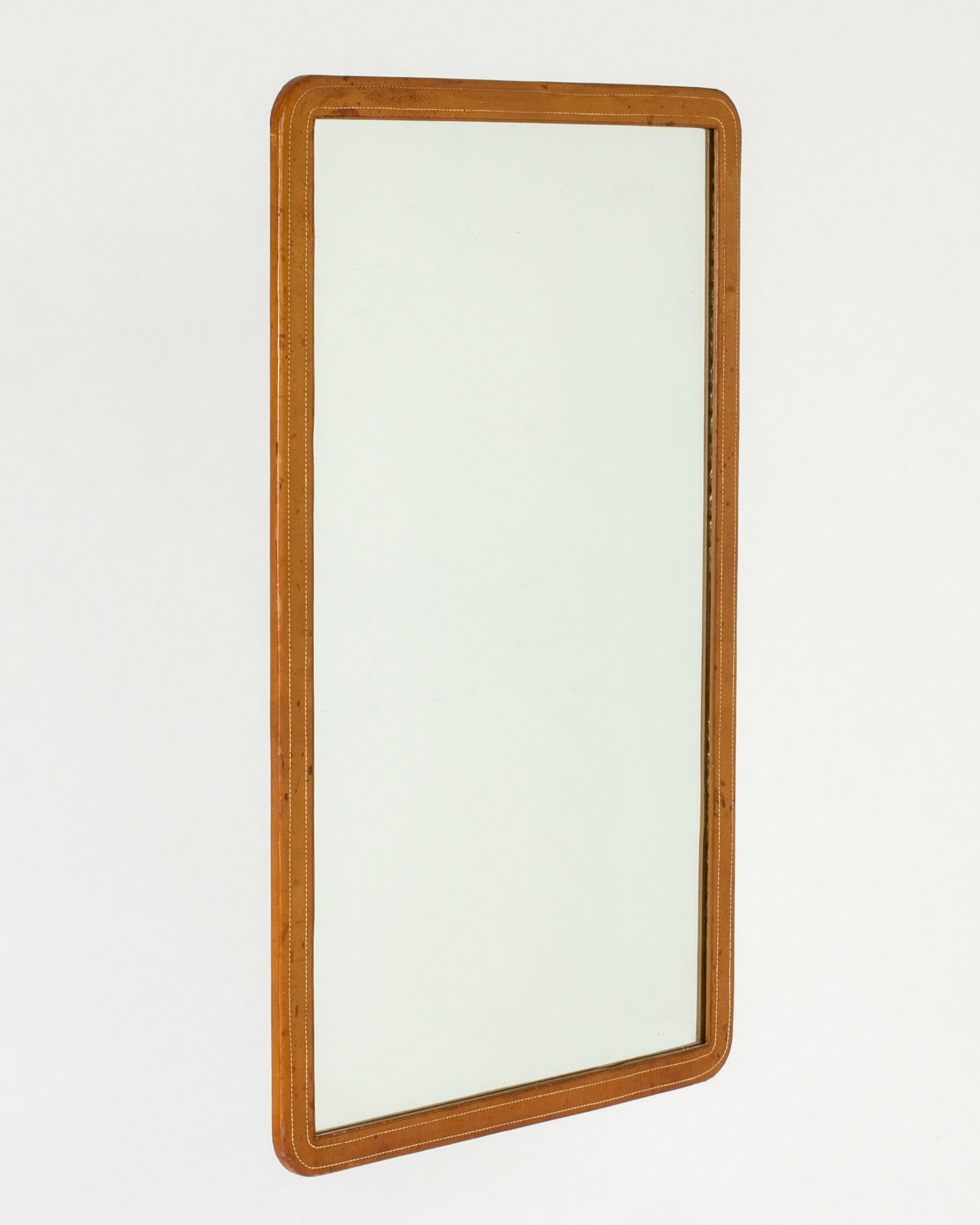Midcentury wall mirror with leather frame, NK, Sweden, 1946 In Good Condition In Stockholm, SE