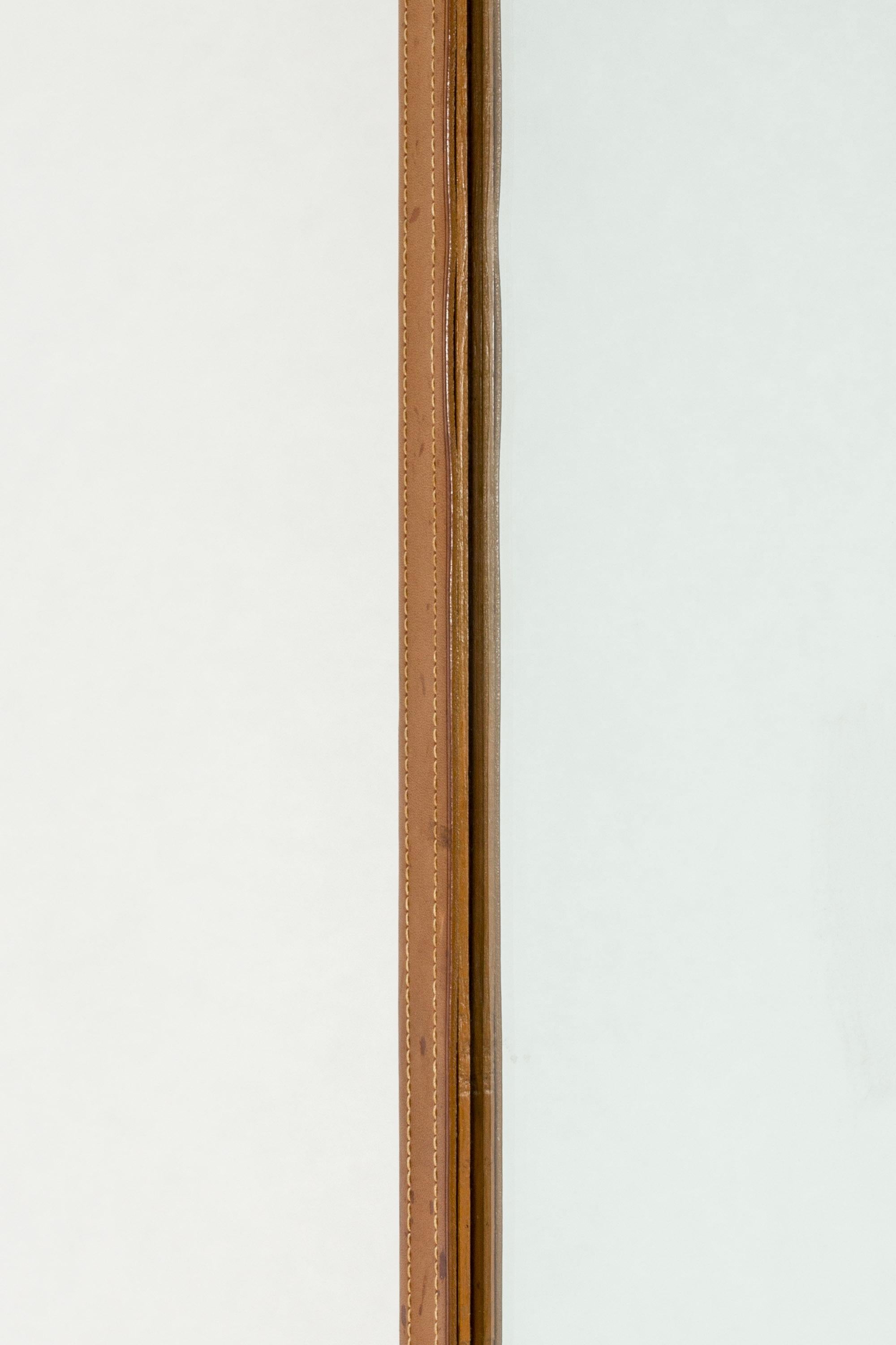Mid-20th Century Midcentury wall mirror with leather frame, NK, Sweden, 1946