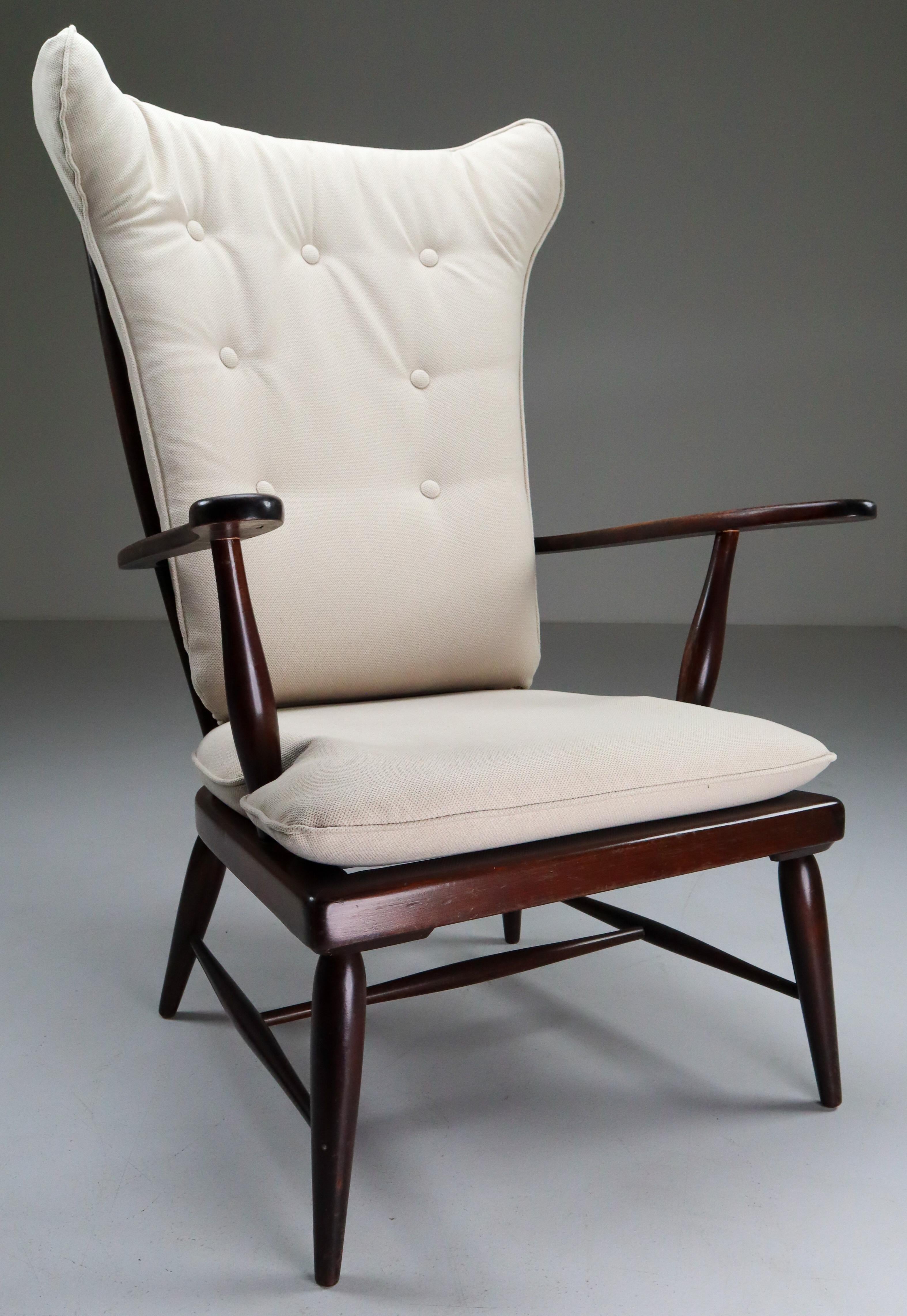 high back armchair with ottoman