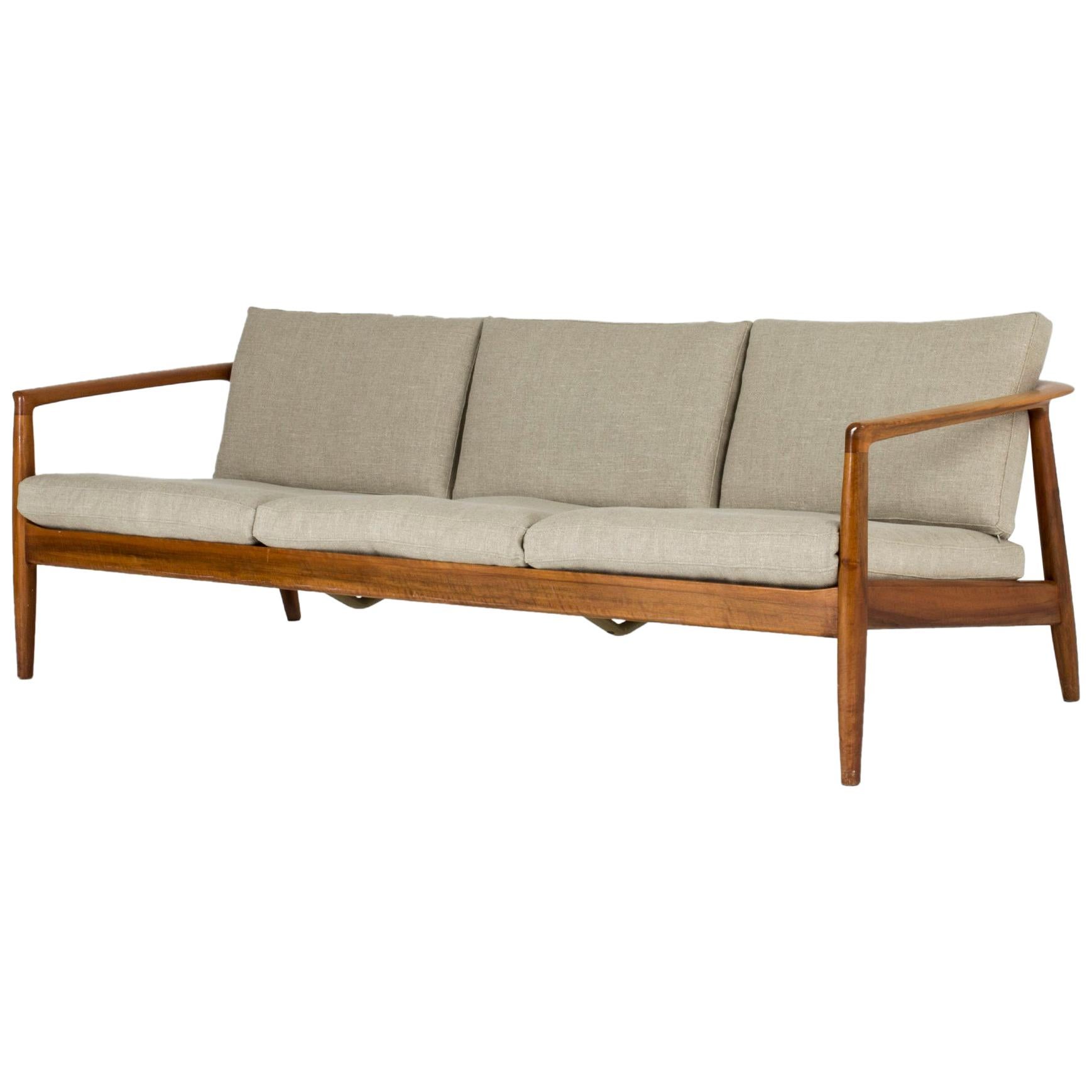 Midcentury walnut sofa by Folke Ohlsson