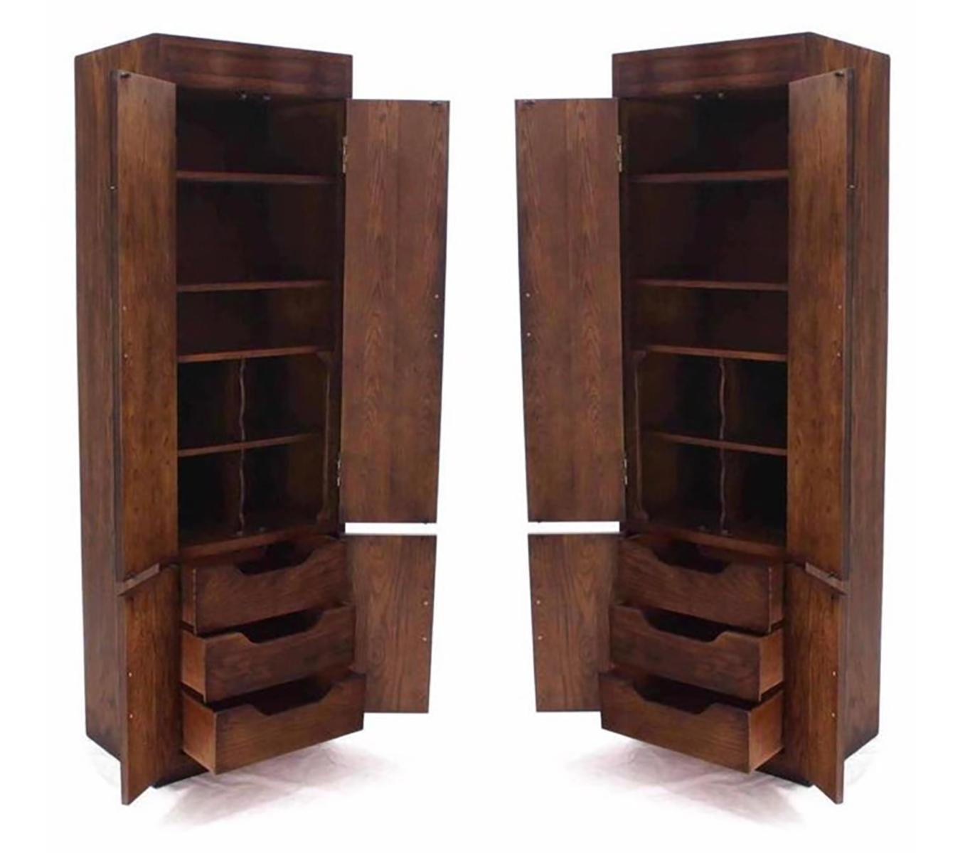 Vintage Campaign style chifforobe or cabinet with four doors, made by esteemed American manufacturer, Henredon. It is part of Henredon’s early Scene One collection. Inside the cabinet there is a combination of dovetailed drawers and shelves. One