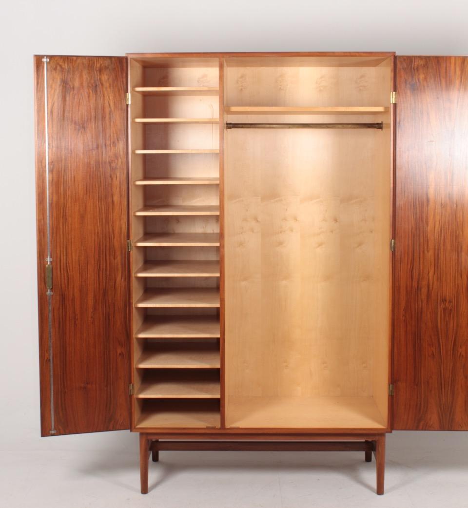 Wardrobes in walnut, designed and made in Denmark. Great original condition.