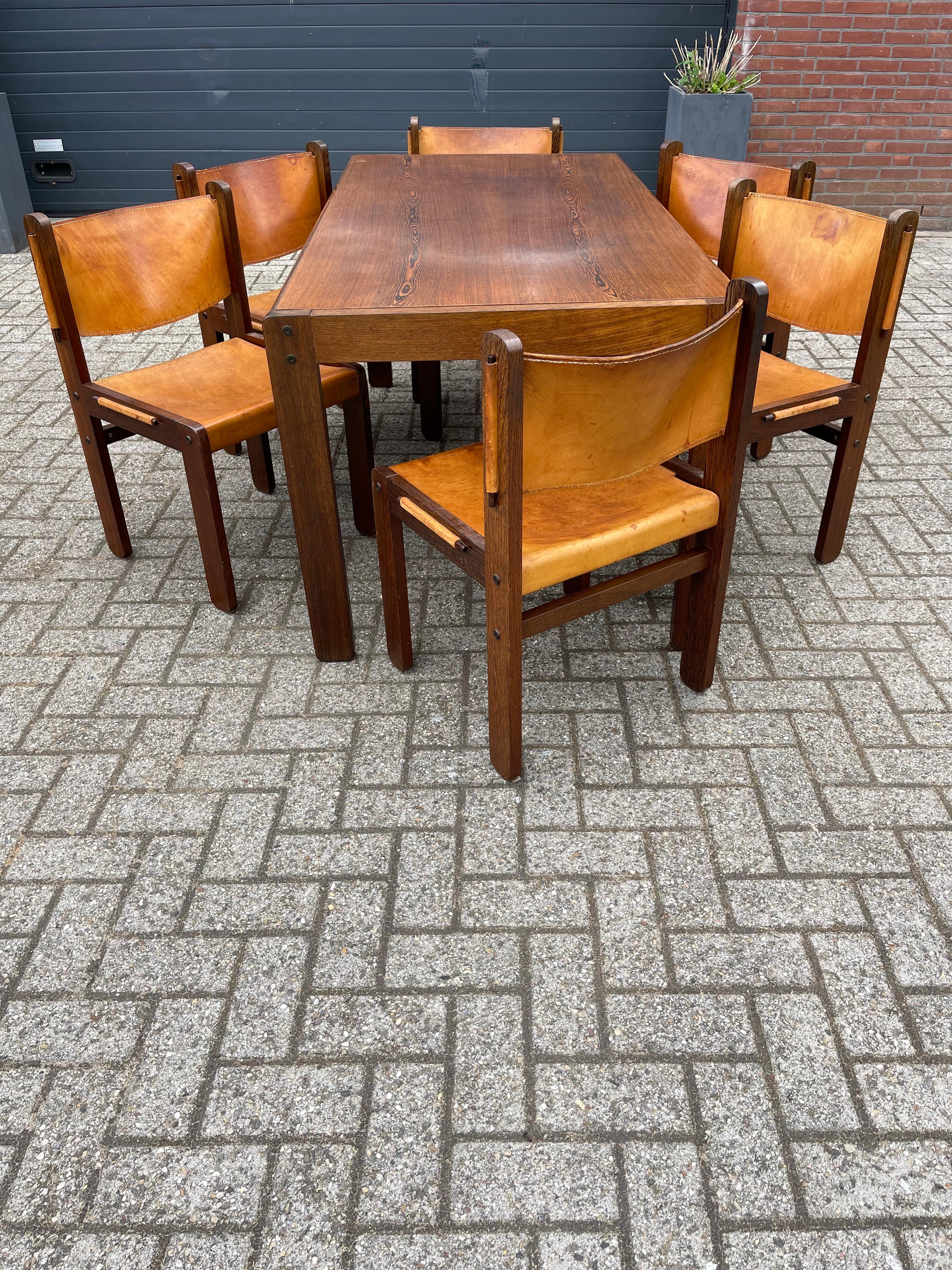 Rare set of six Mid-Century Modern chairs and table, 1970.

If you are looking for a great quality dining set for your home or office then these midcentury made chairs and table could be perfect for you. All hand-crafted out of solid wengé (a
