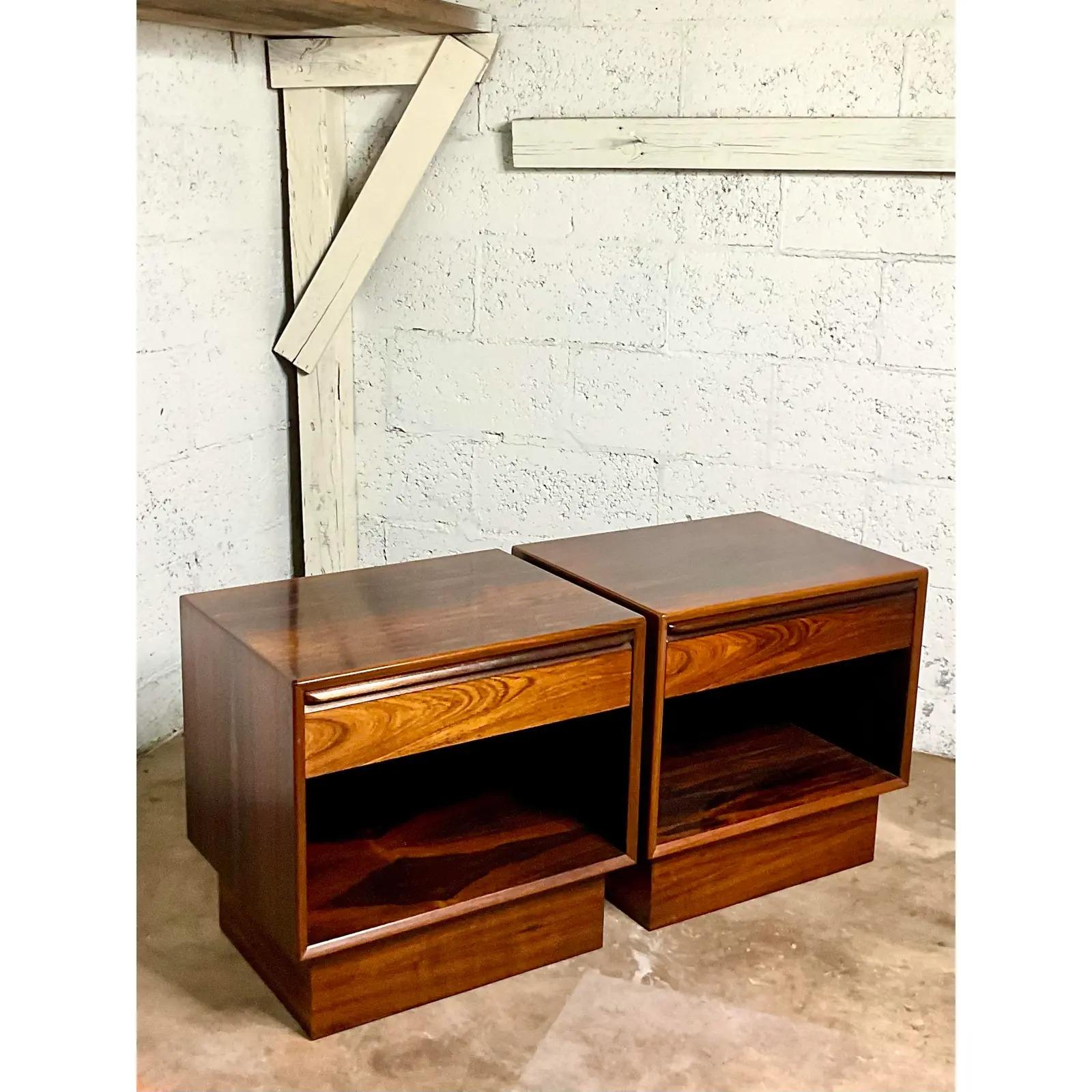 Fantastic pair of vintage MCM nightstands. Made by the iconic Westnofa group in Norway. Incredible wood grain detail and in immaculate condition. Matching dresser also available. Acquired from a Palm Beach estate.
