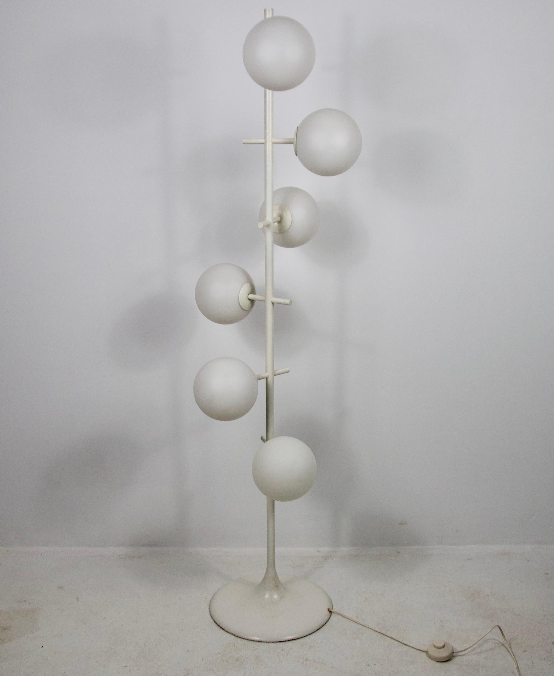 This rare and elegant midcentury floor lamp, designed by Max Bill for Temde in the 1960s, is a remarkable example of Space Age design. Made in Switzerland, it captivates with its sculptural form and six opal glass globes, which emit a warm, diffused