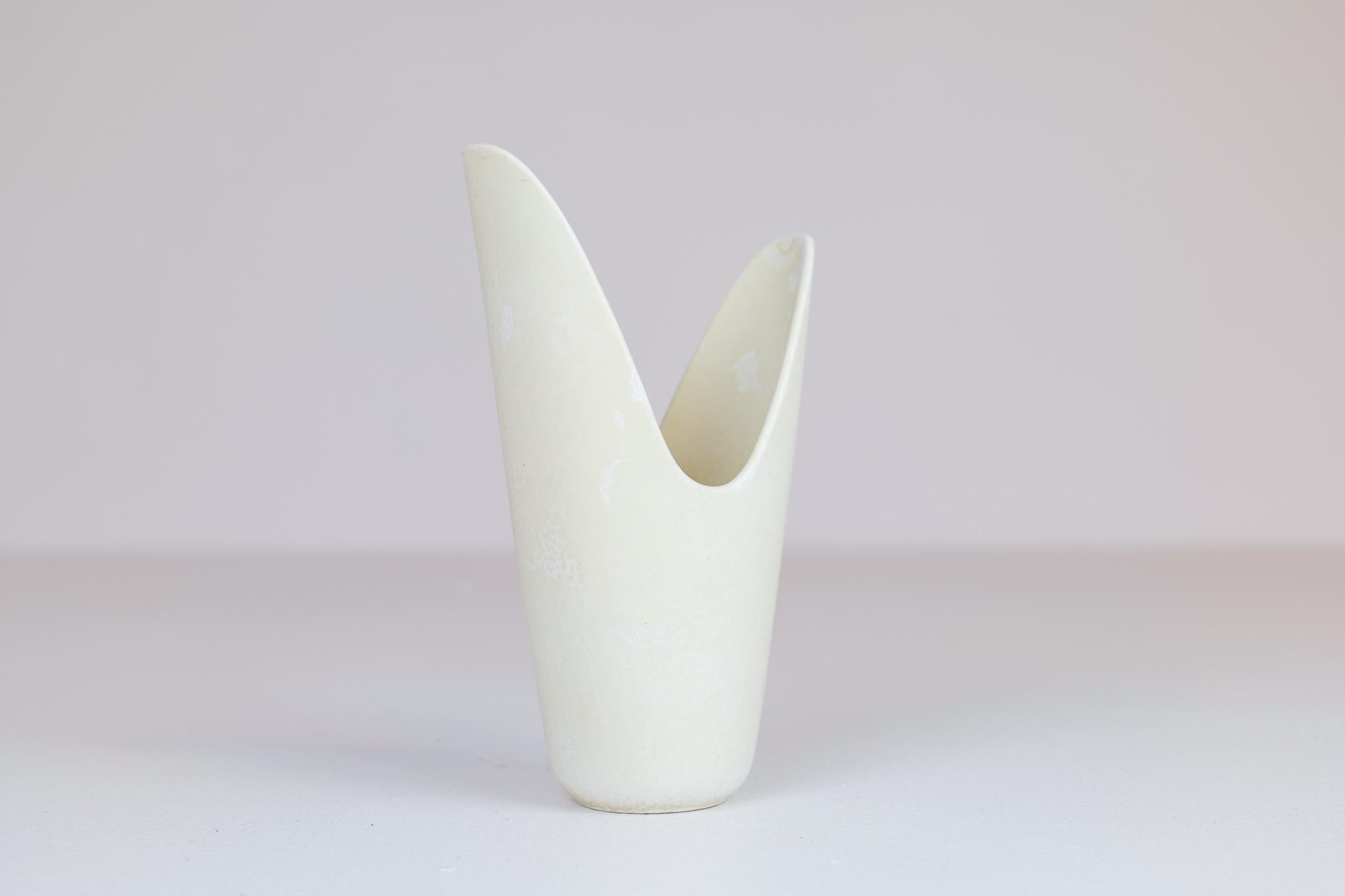 This unusual stoneware vase named 