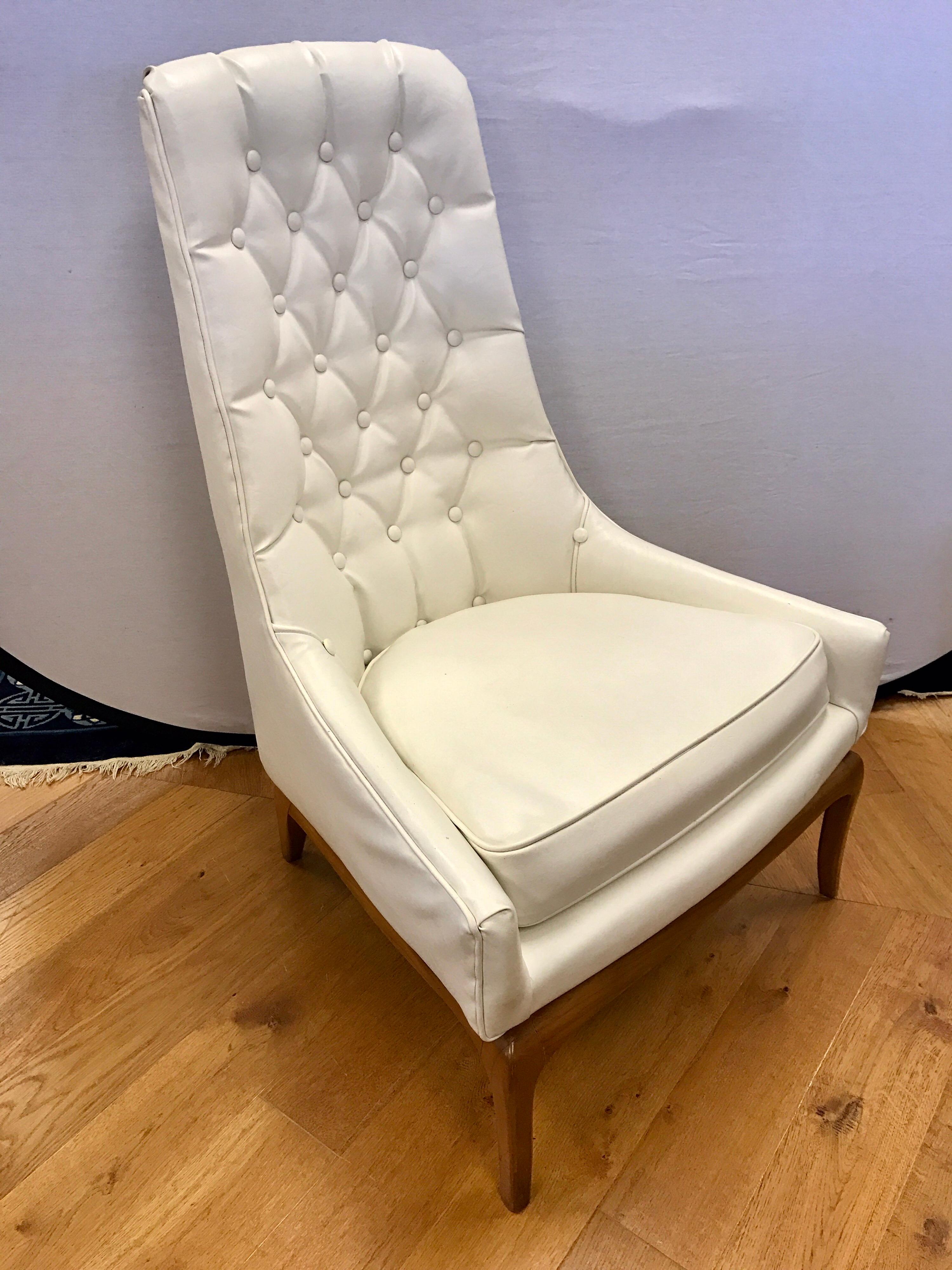 Widdicomb chair in original white faux leather fabric from the 1950's. Most of the tag has fallen off but we believe it to be T.H. Robsjohn-Gibbings designed based on tag present and workmanship/design. The fabric is in decent shape but there are