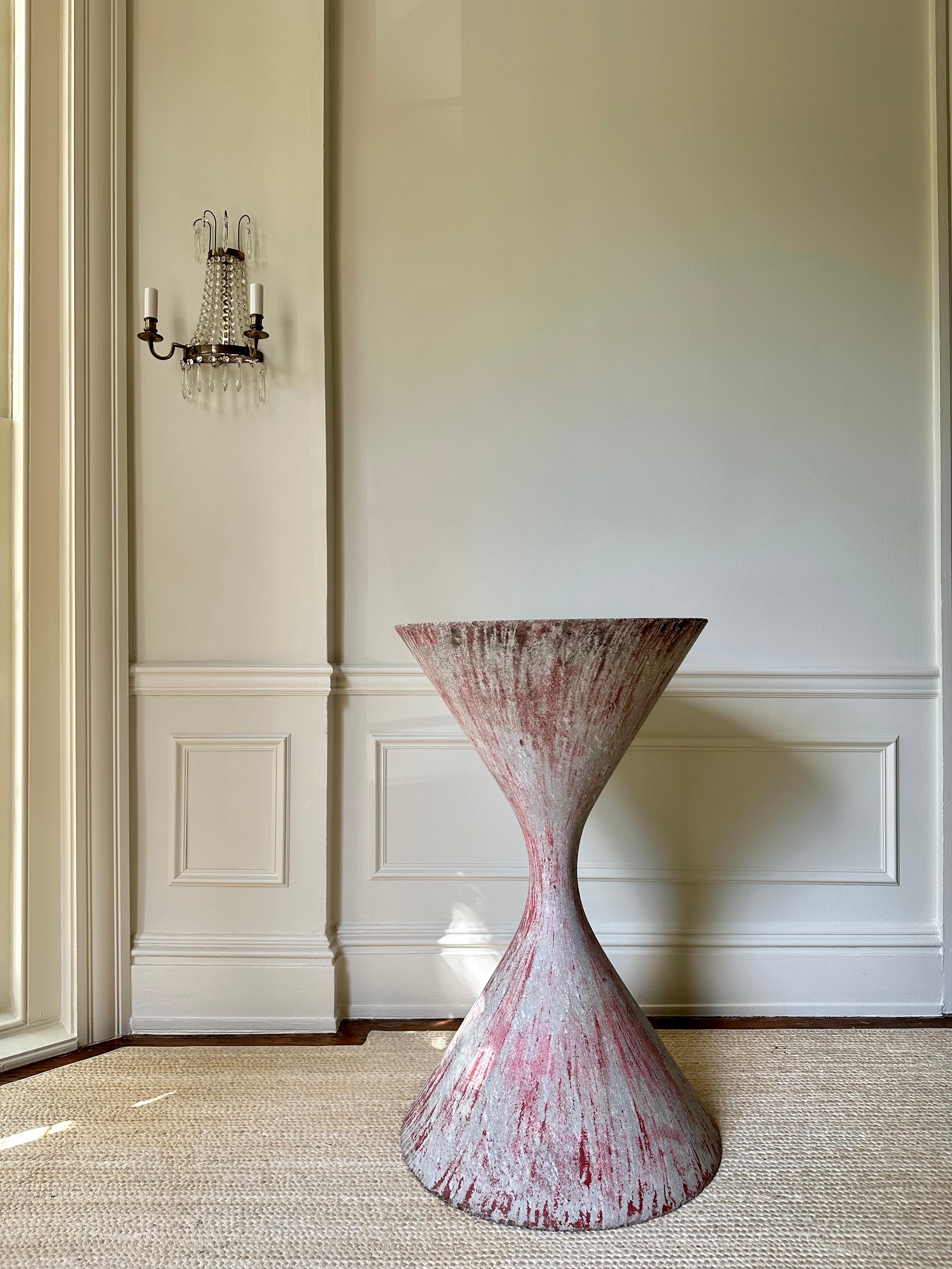 An iconic 'Spindel’ Planter by Swiss Architect Willy Guhl for Eternit. This lovely planter with decades of European patina sourced from a French estate is equally beautiful indoors or out as a stand alone sculpture. I love this piece’s beautiful