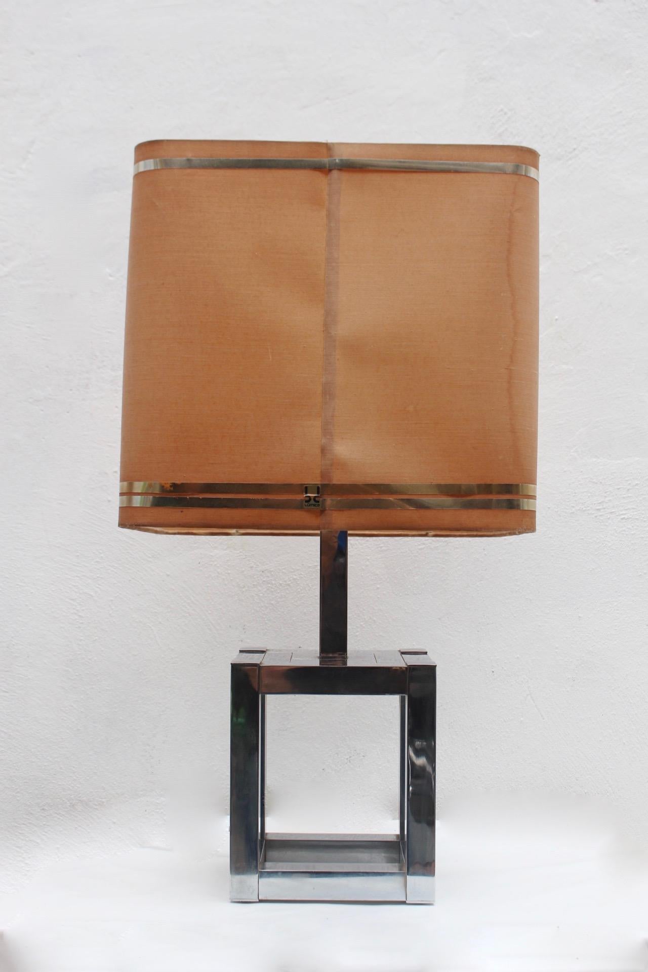 Midcentury sculptural chromed cubic table lamp designed by Willy Rizzo for Lumica, Italy, 1970s.
Original switch. Original shade in fair condition.