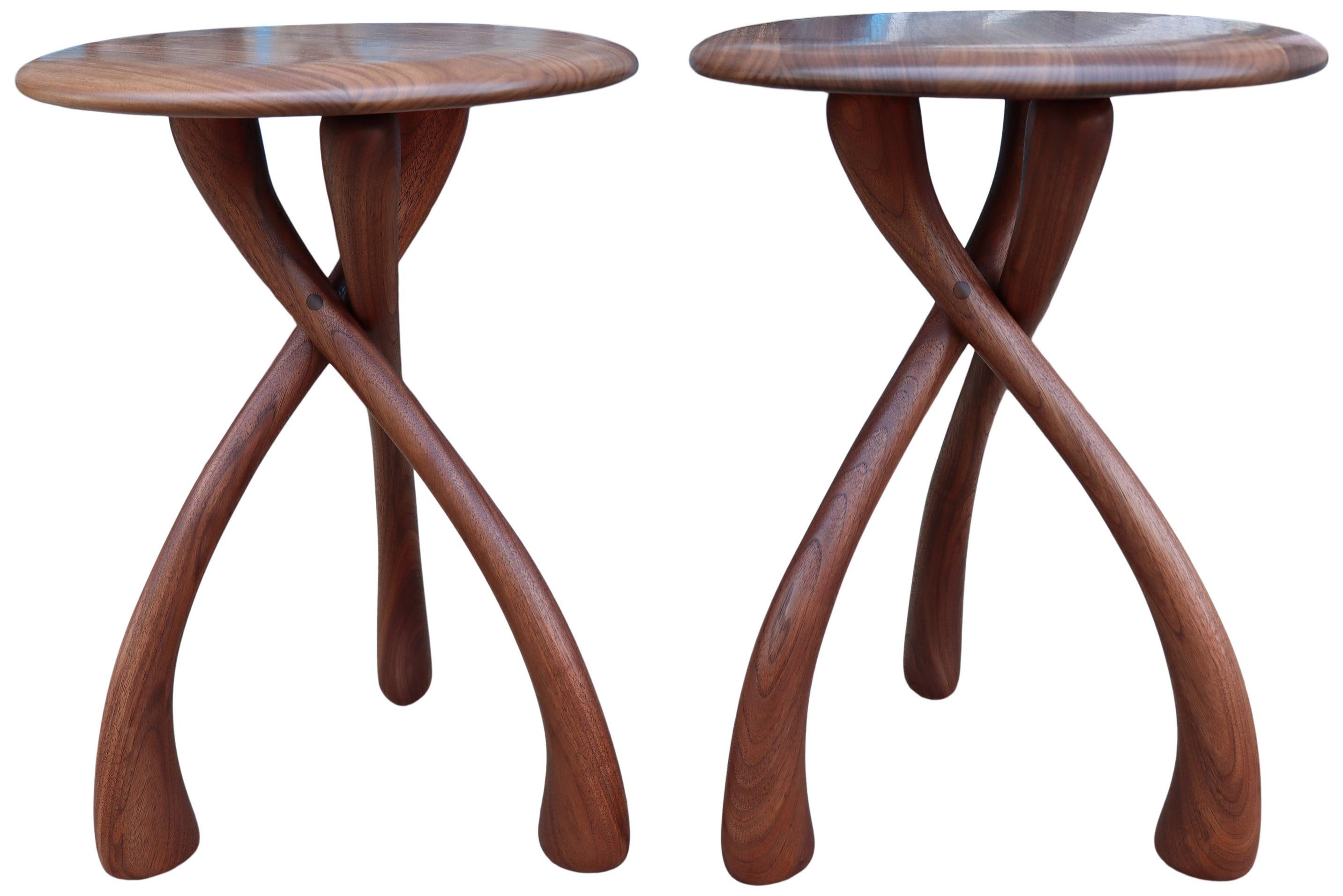 

Beautiful iconic wishbone circular table designed by Dean Santner featuring black walnut construction. This amazing design looks simple yet complex at the same time. Wonderful proportions make great use as a side table, end table, bedside tables