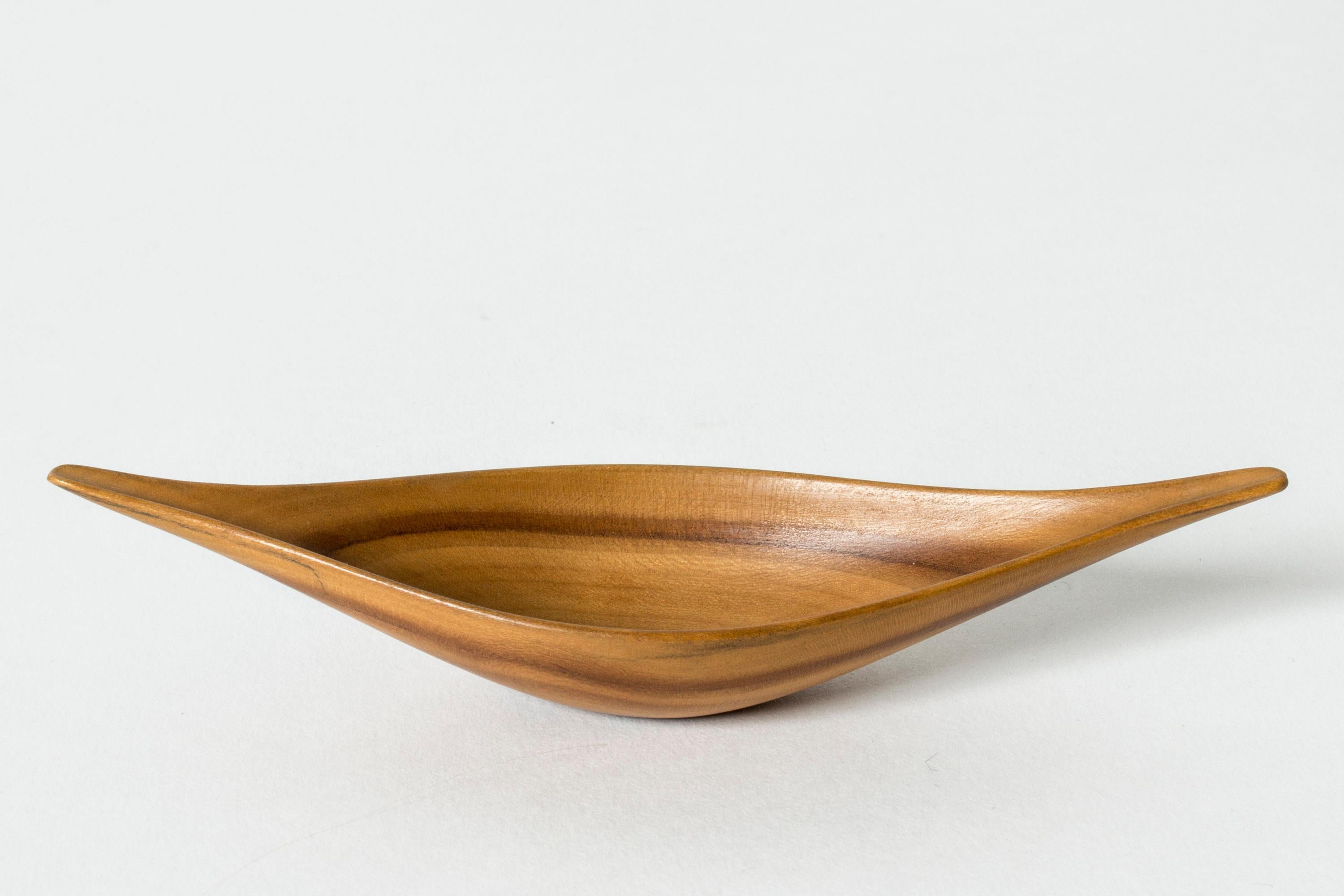 Lovely small bowl by Johnny Mattsson, sculpted from fruitwood with different nuances. Long form, tapering edges.