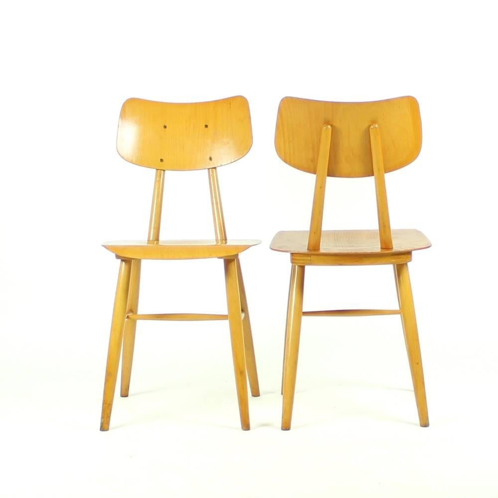 These charming chairs were produced by TON company in 1960s. The model is also commonly known as kitchen chairs, because they often found their place by the kitchen table. The chairs are fully made of wood. The seat and backrest in natural wooden