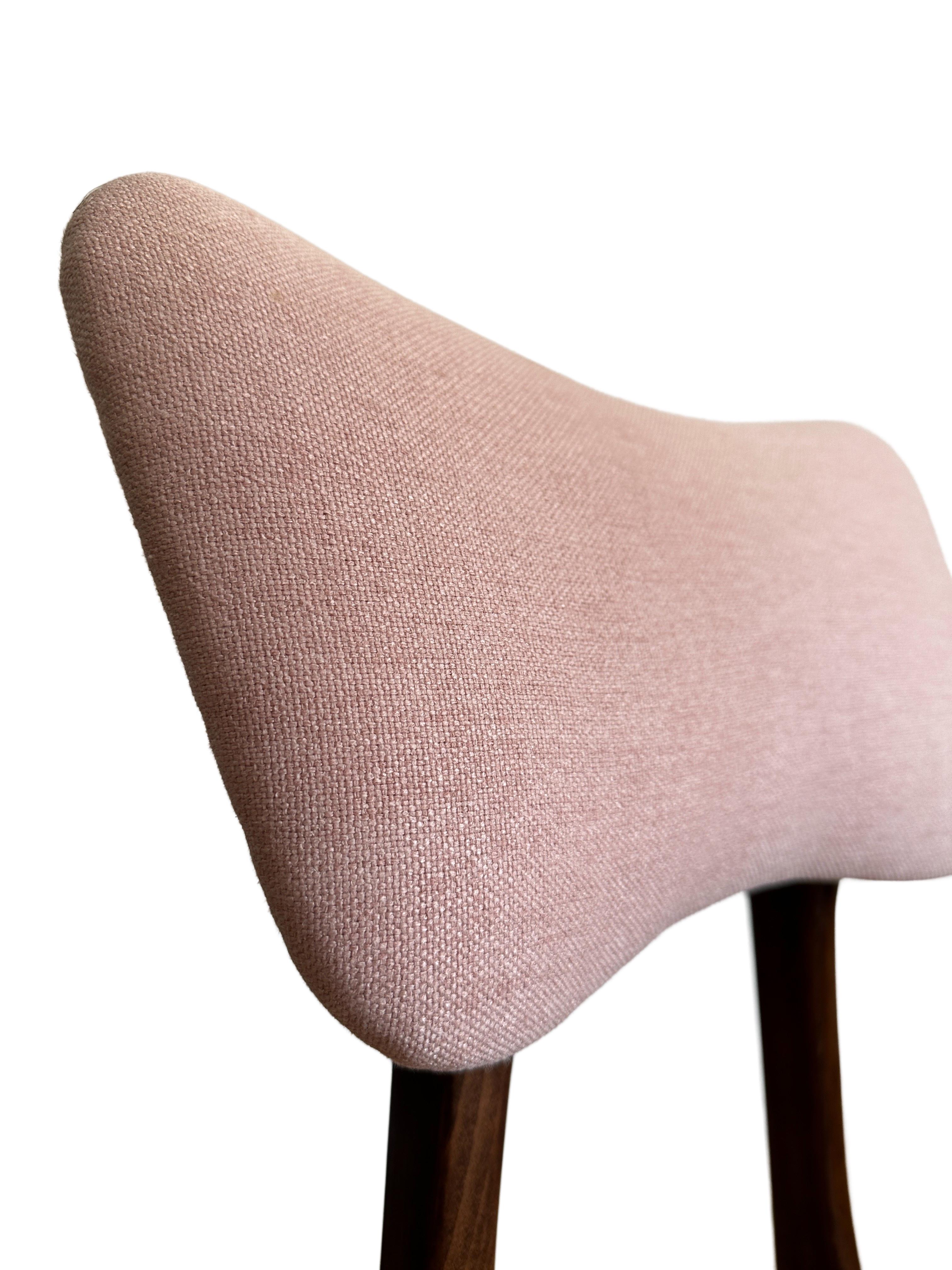 Unique chair manufactured in Poland in the 1960s, designed by Rajmund Halas. 

The upholstery is made of fabric with an interesting structure of thickly woven canvas, nice and soft to the touch. The fabric is covered with a protective finish that