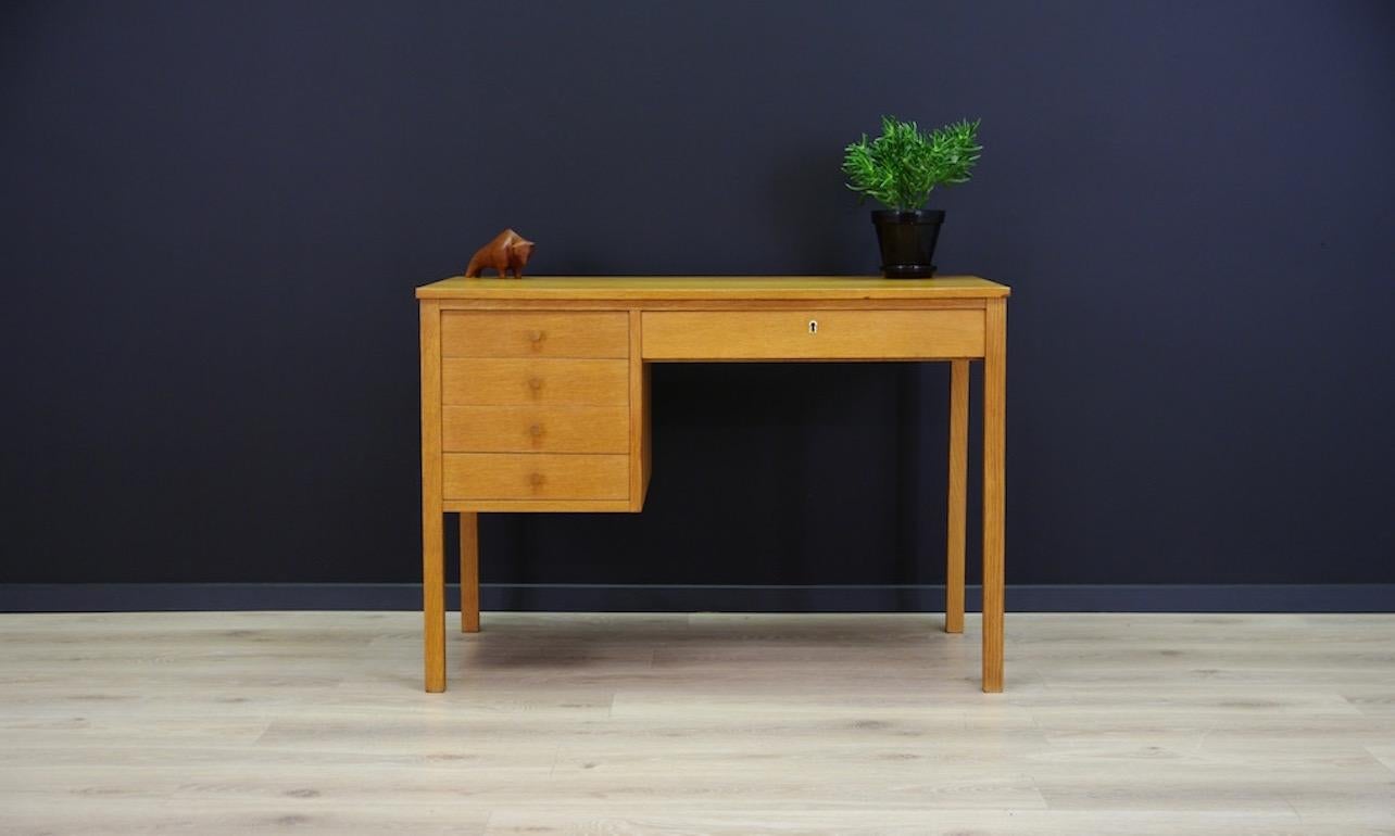 Retro desk of the 1960s-1970s. Beautiful straight line - Scandinavian design. Item veneered with ash. Handles and legs made of ash. Five practical drawers. No key. Desk in good condition (small scratches are visible, veneer losses