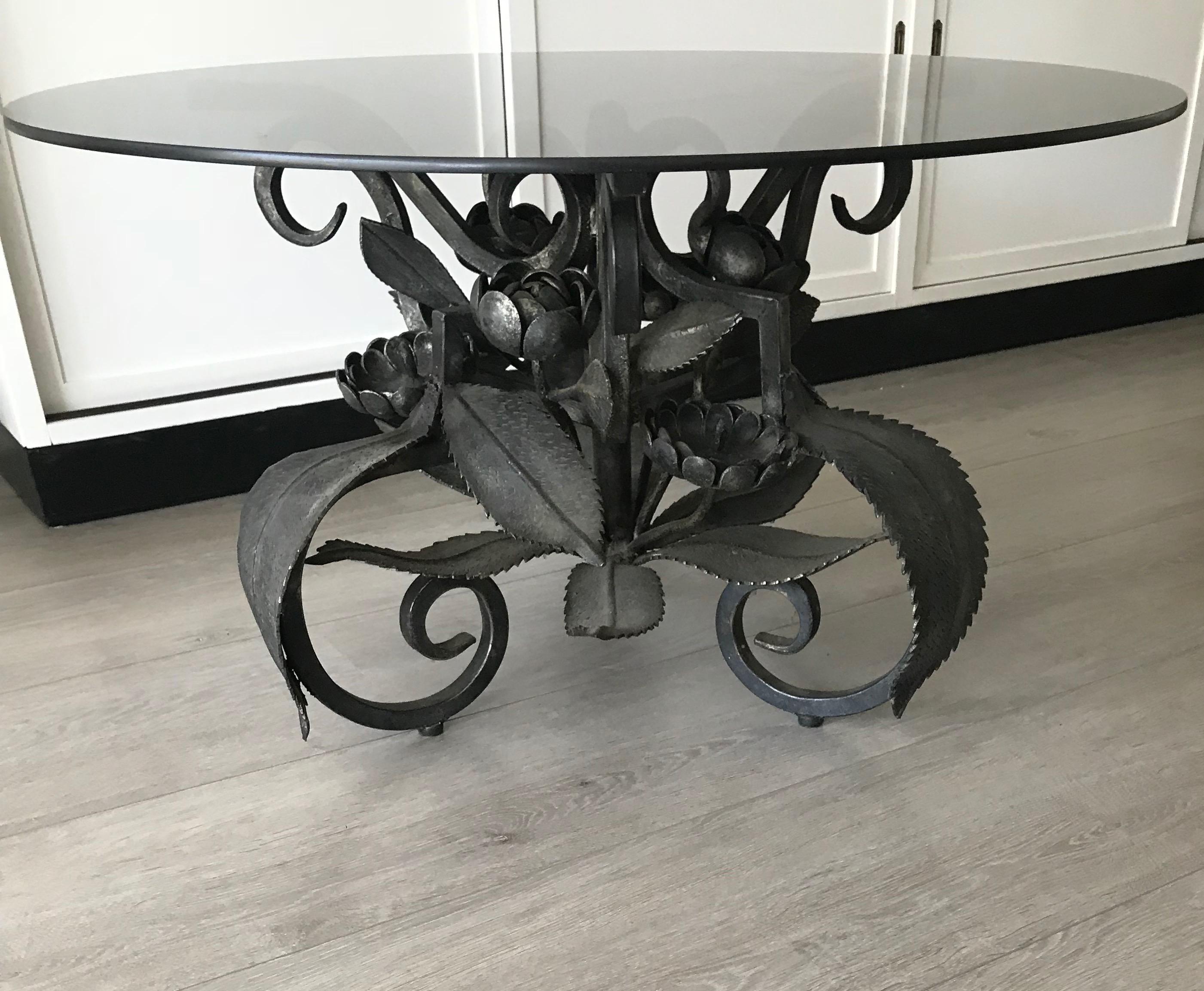 black wrought iron coffee table with glass top