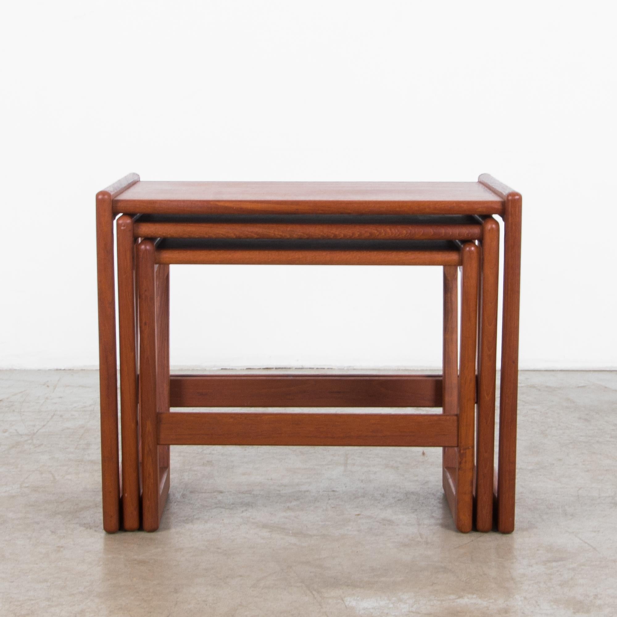 This set of wooden nesting tables, designed in Denmark in the 1970s, features geometric legs in a playful nesting configuration. The simplicity of the design is a stamp of Scandinavian Modernism, as is the attention to craftsmanship. Rounded edges