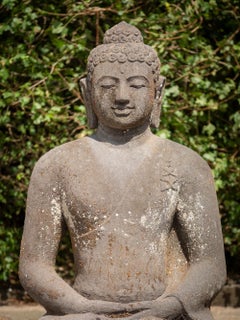 Middle 20th century large old lavastone Buddha statue in Dharmachakra mudra