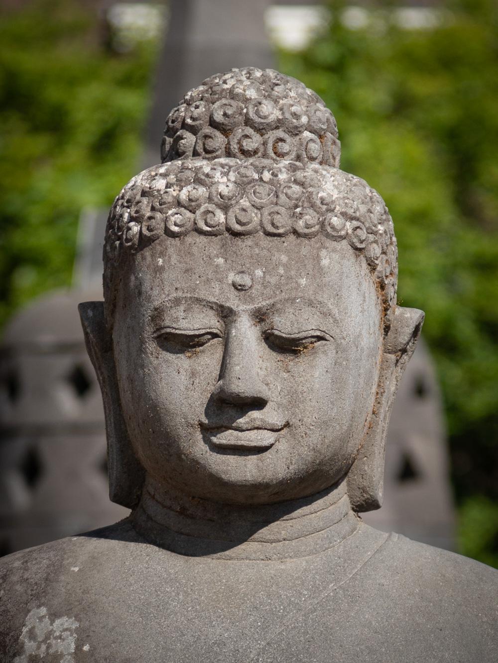 Indonesian Middle 20th century large old lavastone Buddha statue in Dharmachakra mudra For Sale