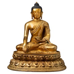 Mediados del siglo XX Antigua estatua de Buda de bronce de Nepal en mudra Bhumisparsha
