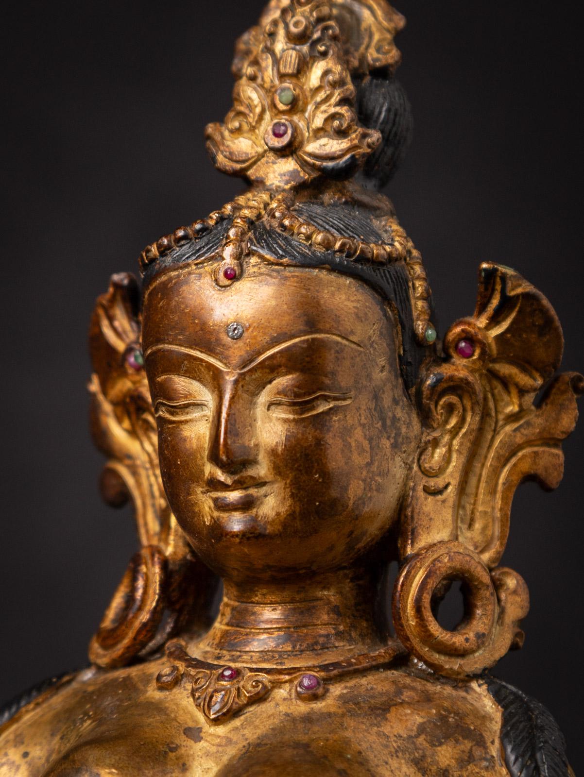 Middle 20th century Old bronze Nepali Basundhara statue in Varada Mudra For Sale 5