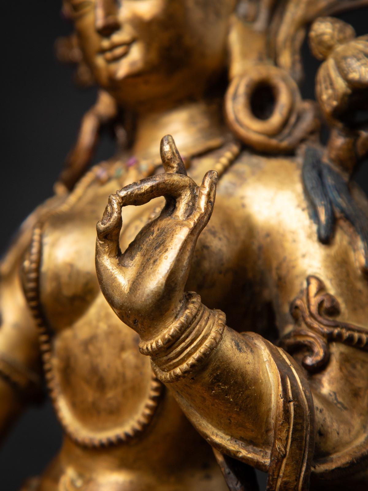 Middle 20th century Old bronze Nepali Basundhara statue in Varada Mudra 6
