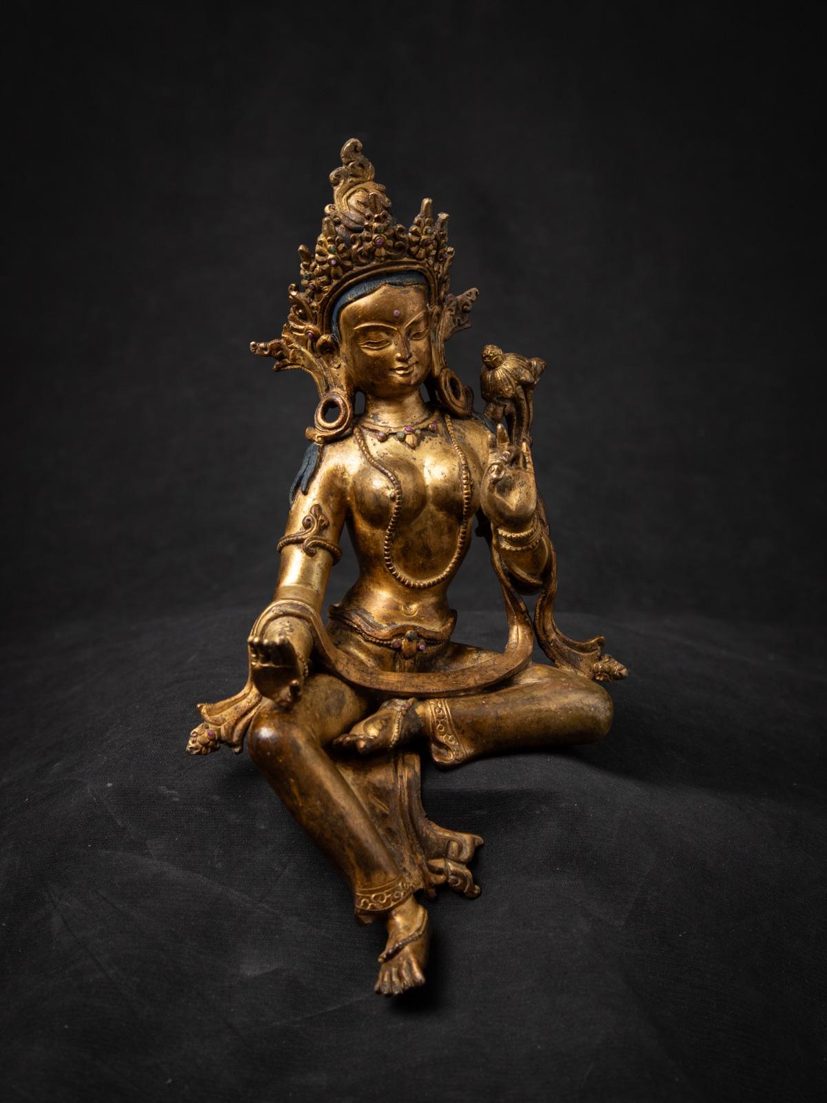 Middle 20th century Old bronze Nepali Basundhara statue in Varada Mudra In Good Condition In DEVENTER, NL