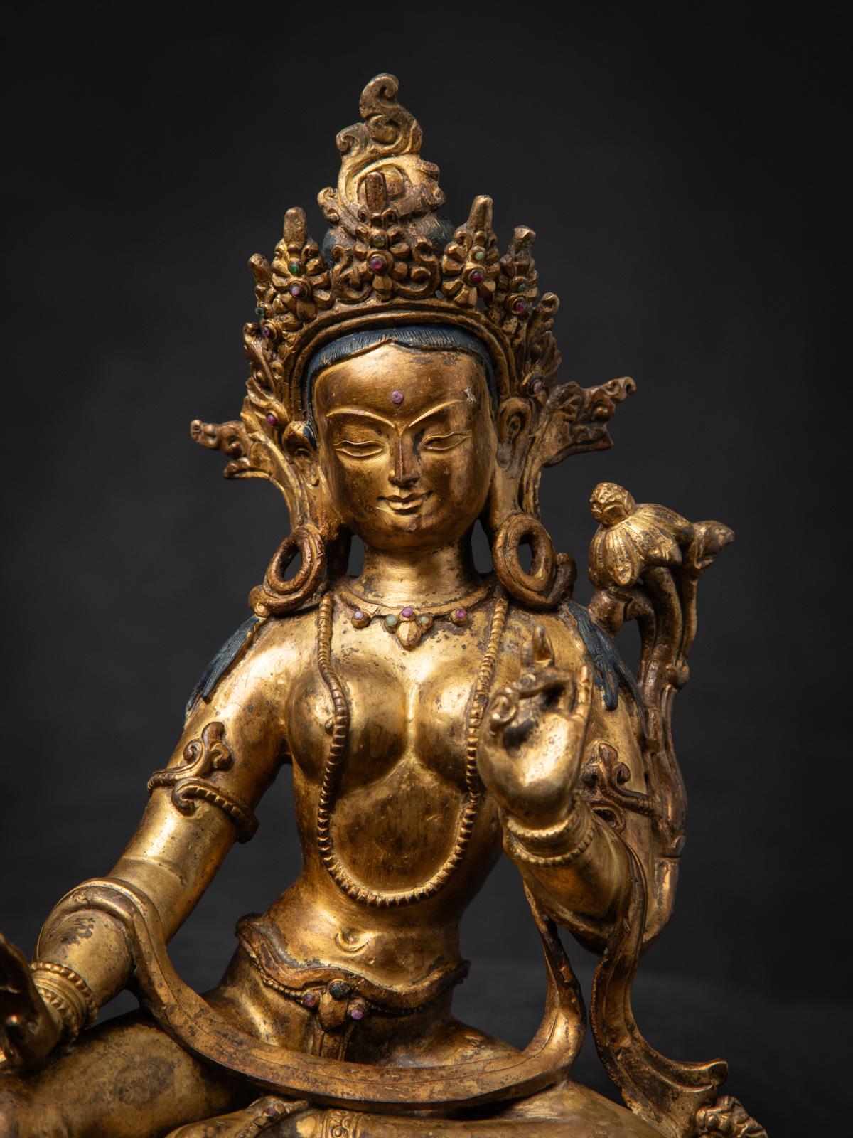 20th Century Middle 20th century Old bronze Nepali Basundhara statue in Varada Mudra