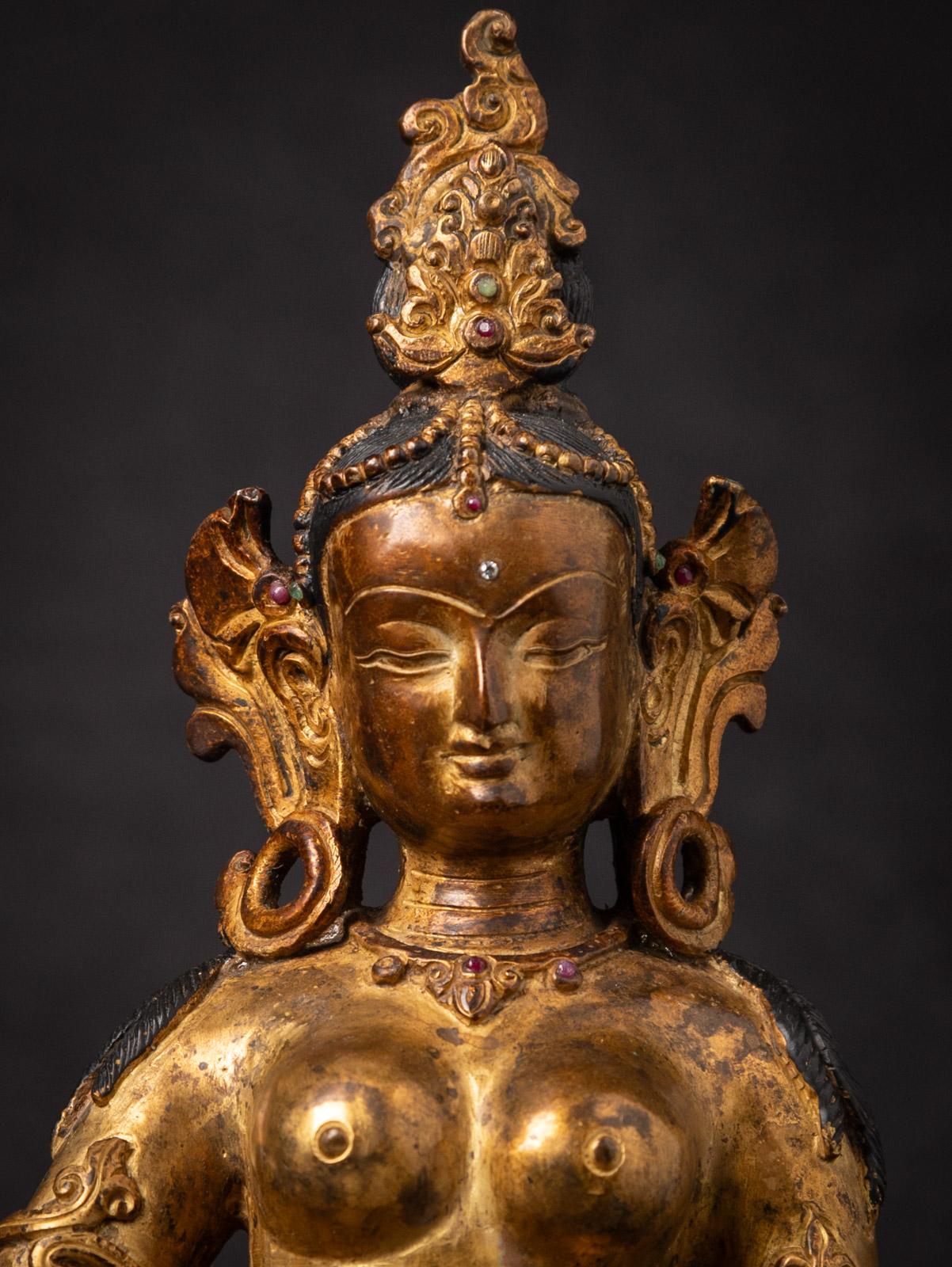 Bronze Middle 20th century Old bronze Nepali Basundhara statue in Varada Mudra For Sale