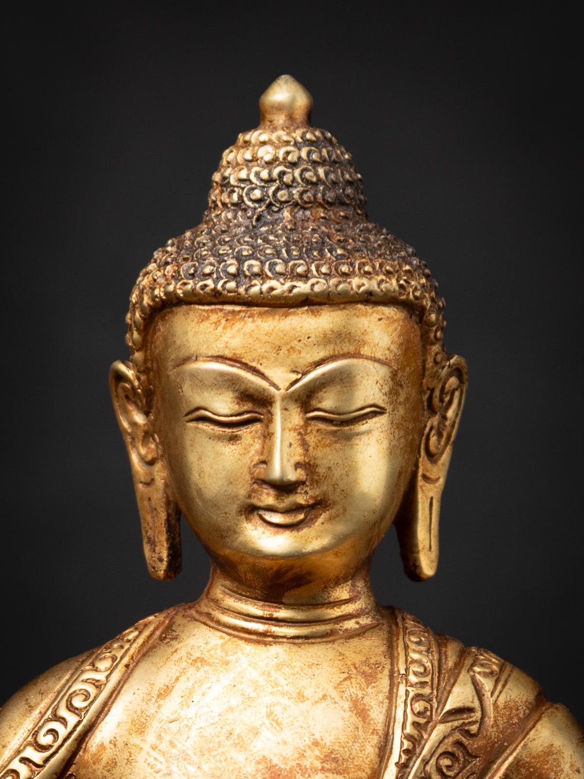Mediados del siglo XX Antigua estatua de Buda nepalí de bronce procedente de Nepal en Bueno estado para la venta en DEVENTER, NL