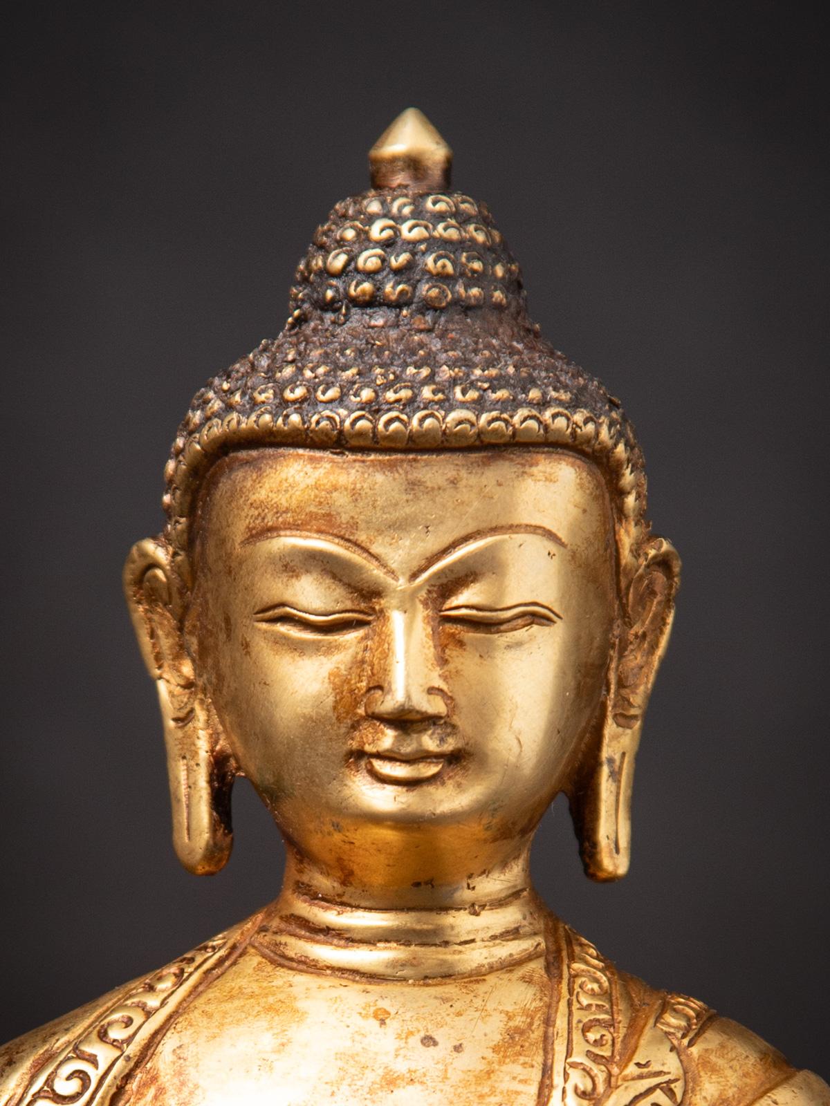Middle 20th century Old bronze Nepali Buddha statue from Nepal In Good Condition For Sale In DEVENTER, NL