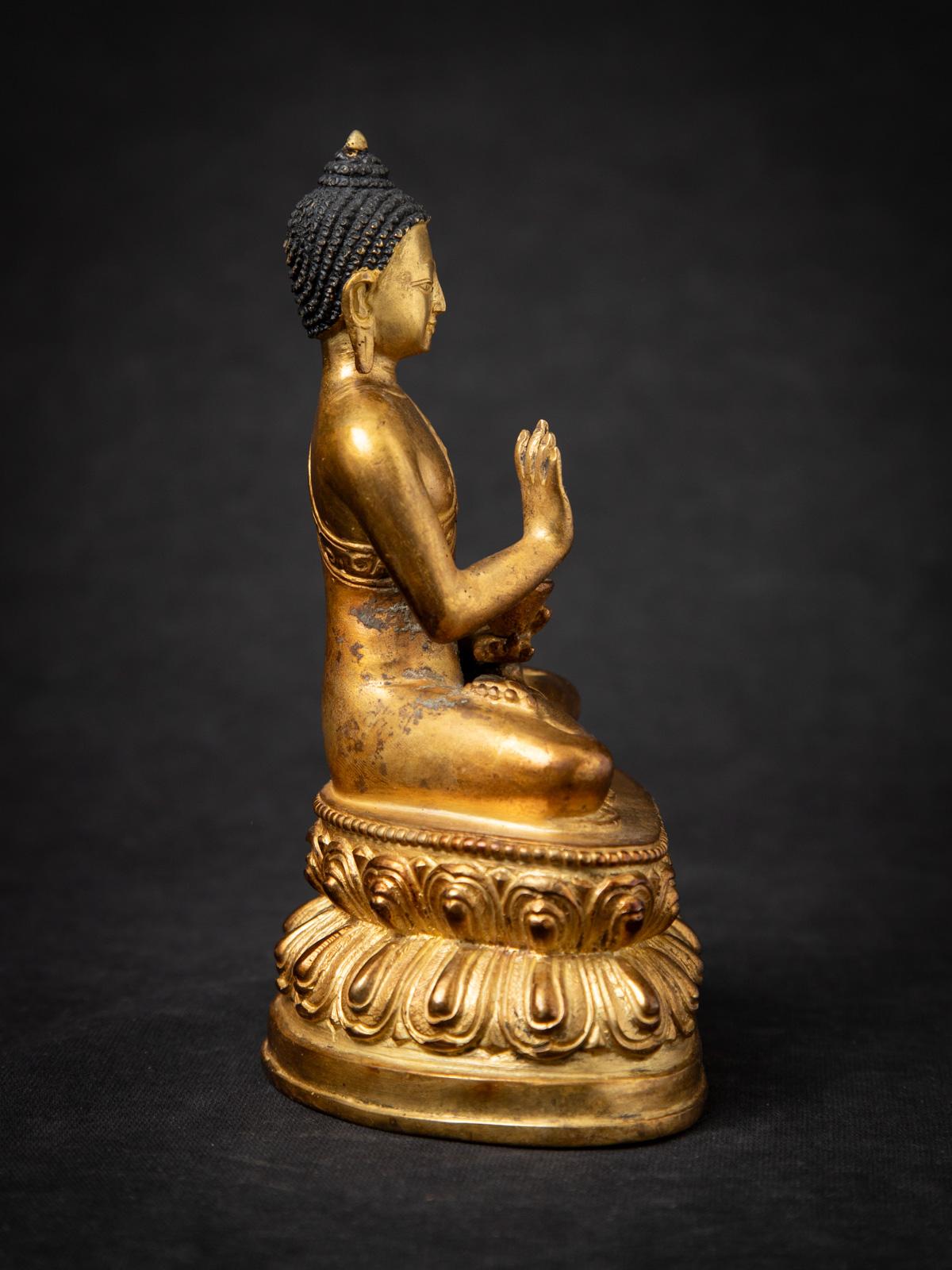 20th Century Middle 20th century Old bronze Nepali Buddha statue in Abhaya mudra