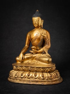 Middle 20th century Old bronze Nepali Buddha statue in Bhumisparsha mudra