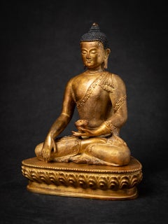 Middle 20th century Old bronze Nepali Buddha statue in Bhumisparsha Mudra