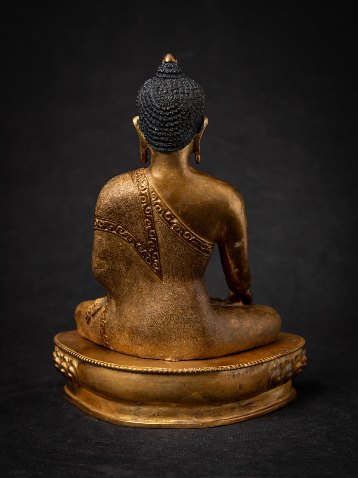 Middle 20th century Old bronze Nepali Buddha statue in Bhumisparsha Mudra In Good Condition In DEVENTER, NL