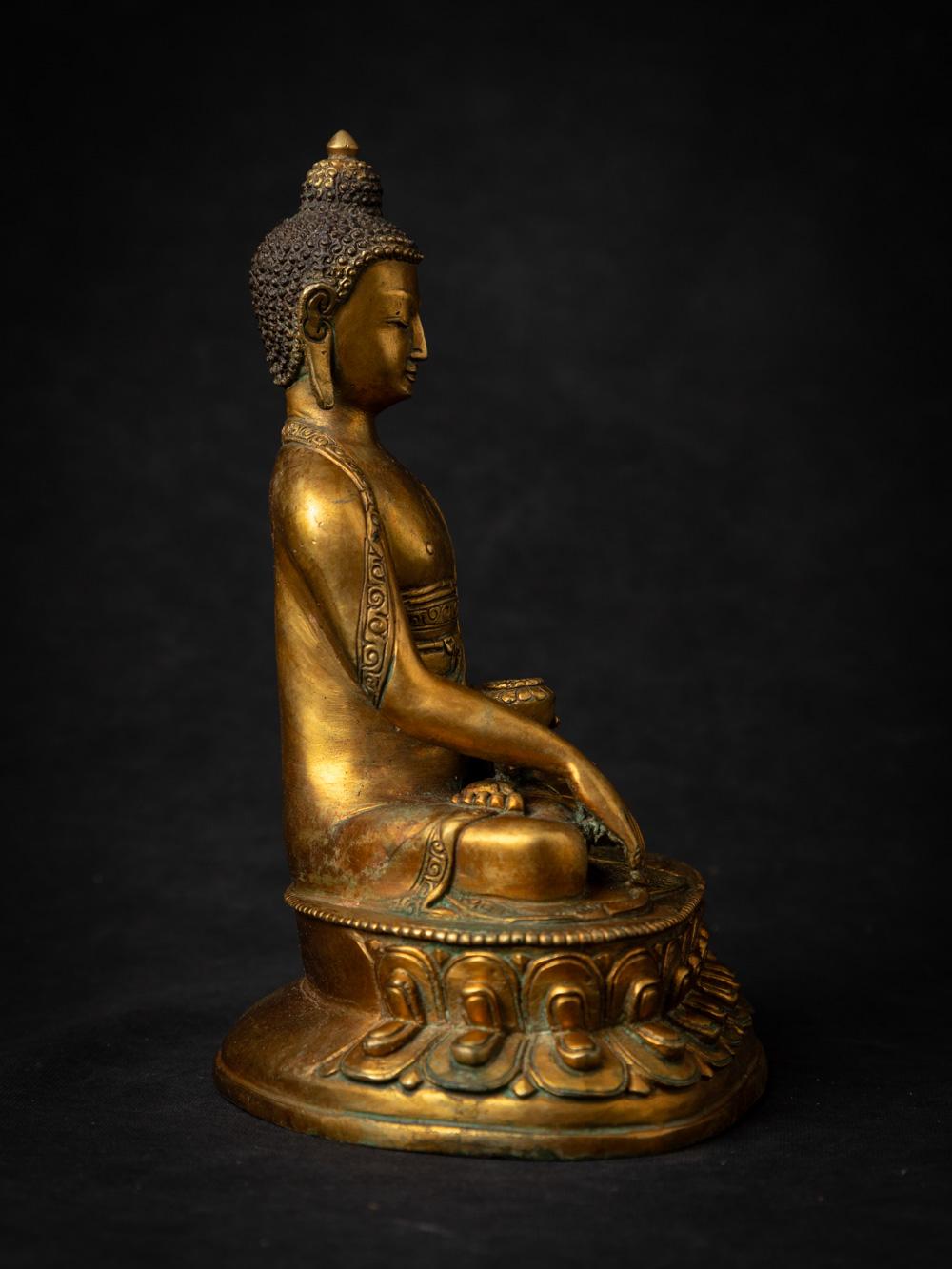 20th Century Middle 20th century old bronze Nepali Buddha statue in Bhumisparsha Mudra