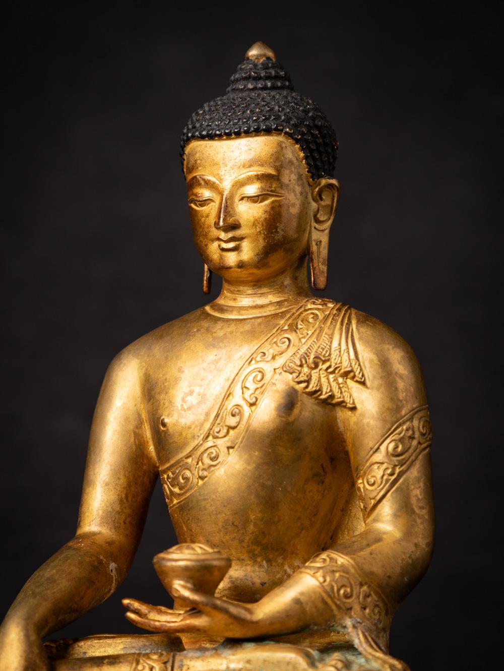 Middle 20th century old bronze Nepali Buddha statue in Bhumisparsha Mudra 1