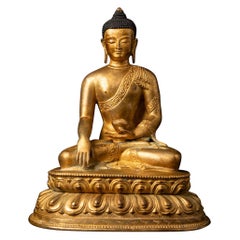 Middle 20th century old bronze Nepali Buddha statue in Bhumisparsha Mudra