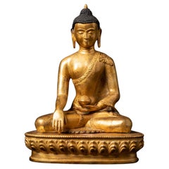 Middle 20th century Old bronze Nepali Buddha statue in Bhumisparsha Mudra