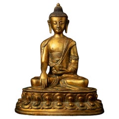 Middle 20th century old bronze Nepali Buddha statue in Bhumisparsha Mudra