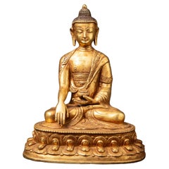 Middle 20th century Old bronze Nepali Buddha statue in Bhumisparsha Mudra