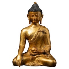 Middle 20th century Old bronze Nepali Buddha statue in Bhumisparsha Mudra