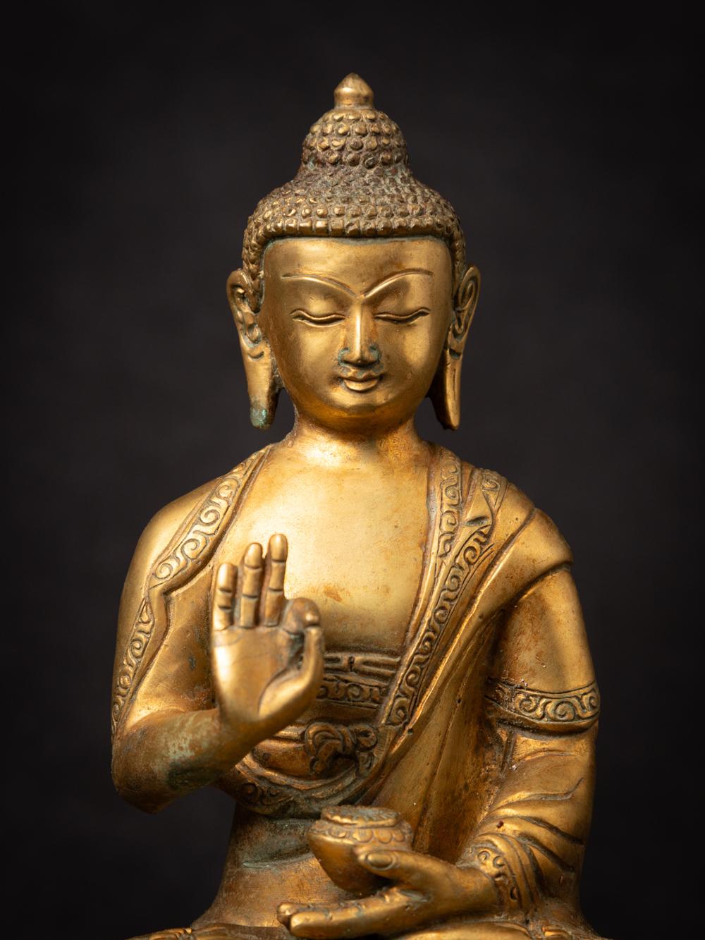 Middle 20th century old bronze Nepali Buddha statue in Vitarka Mudra In Good Condition In DEVENTER, NL