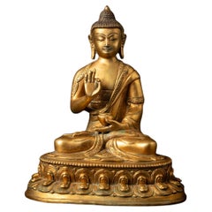 Middle 20th century old bronze Nepali Buddha statue in Vitarka Mudra