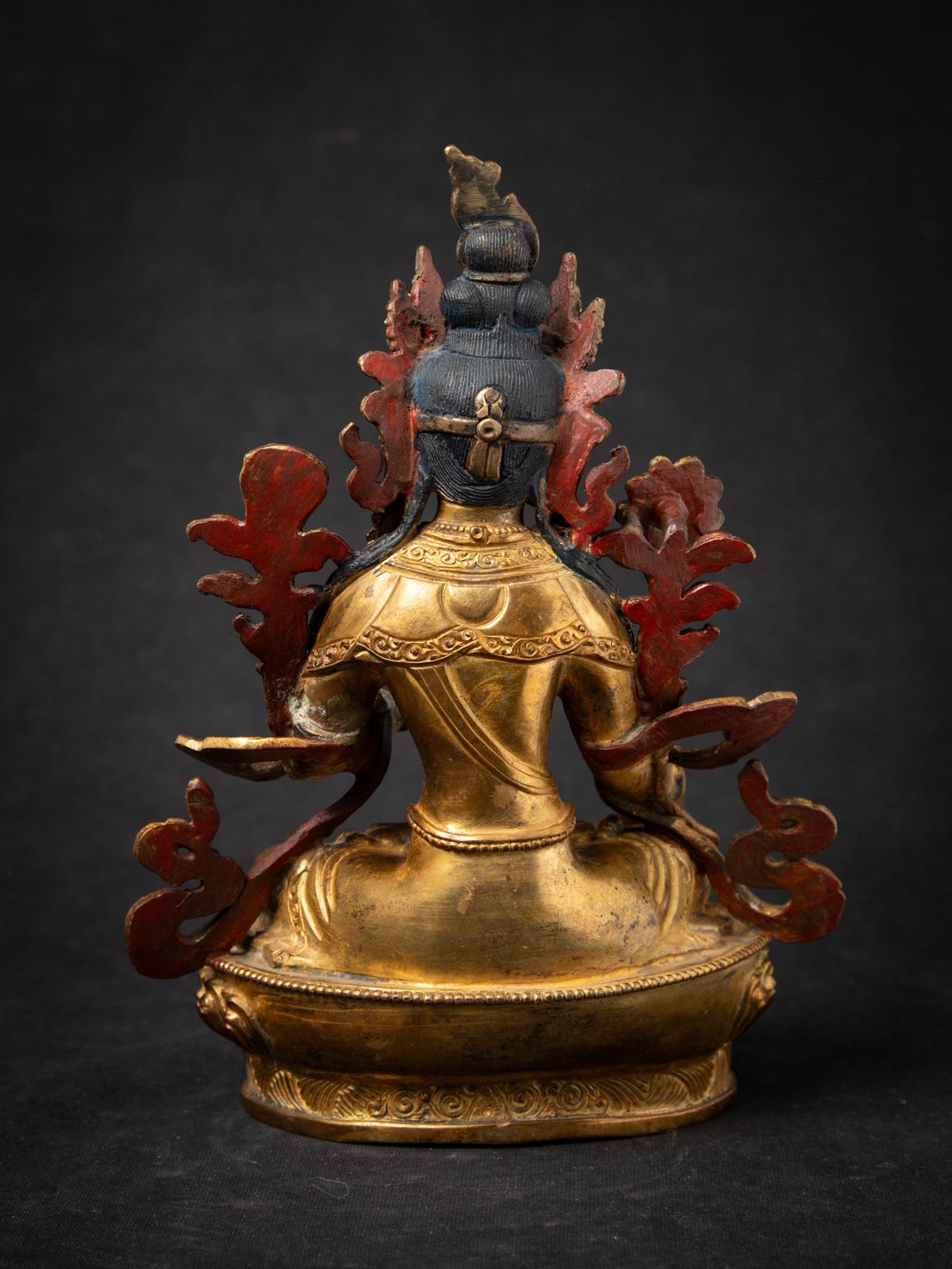 Middle 20th century Old bronze Nepali White Tara statue in Varada mudra In Good Condition For Sale In DEVENTER, NL